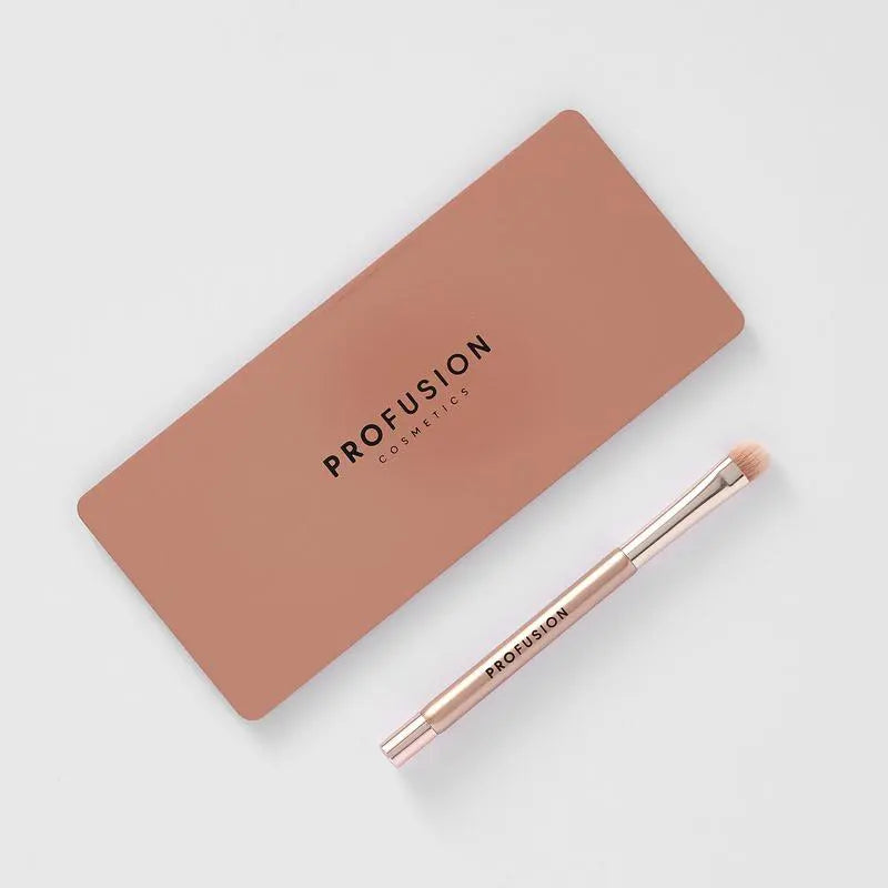 Profusion Cosmetics Magnetix display stand with eyeshadow makeup brushes arranged on a sleek holder.
