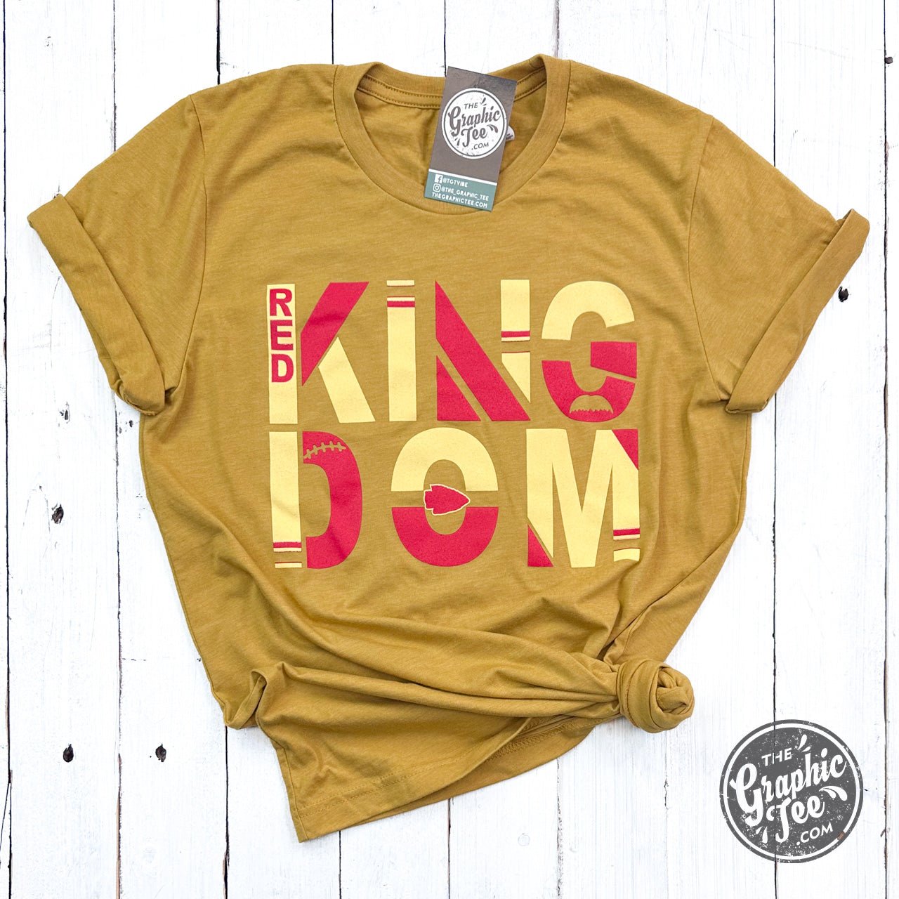 Red Kingdom short sleeve graphic tee by The Graphic Tee, featuring bold print on a vibrant red cotton fabric.