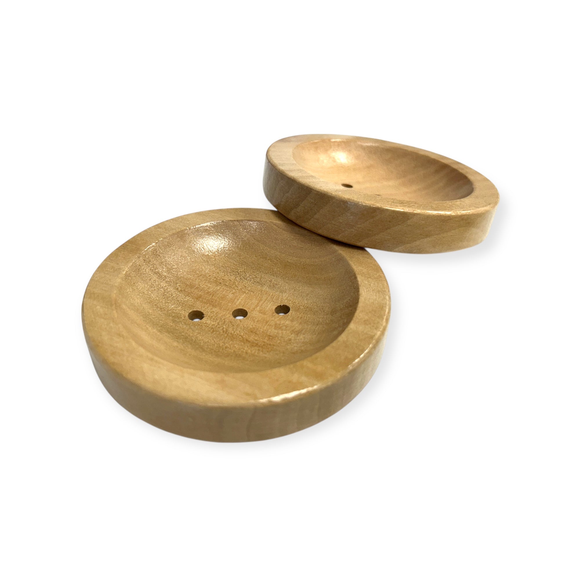 Round wood soap dish from Refillism, designed for personal care, featuring a natural wooden finish and simple, functional design.