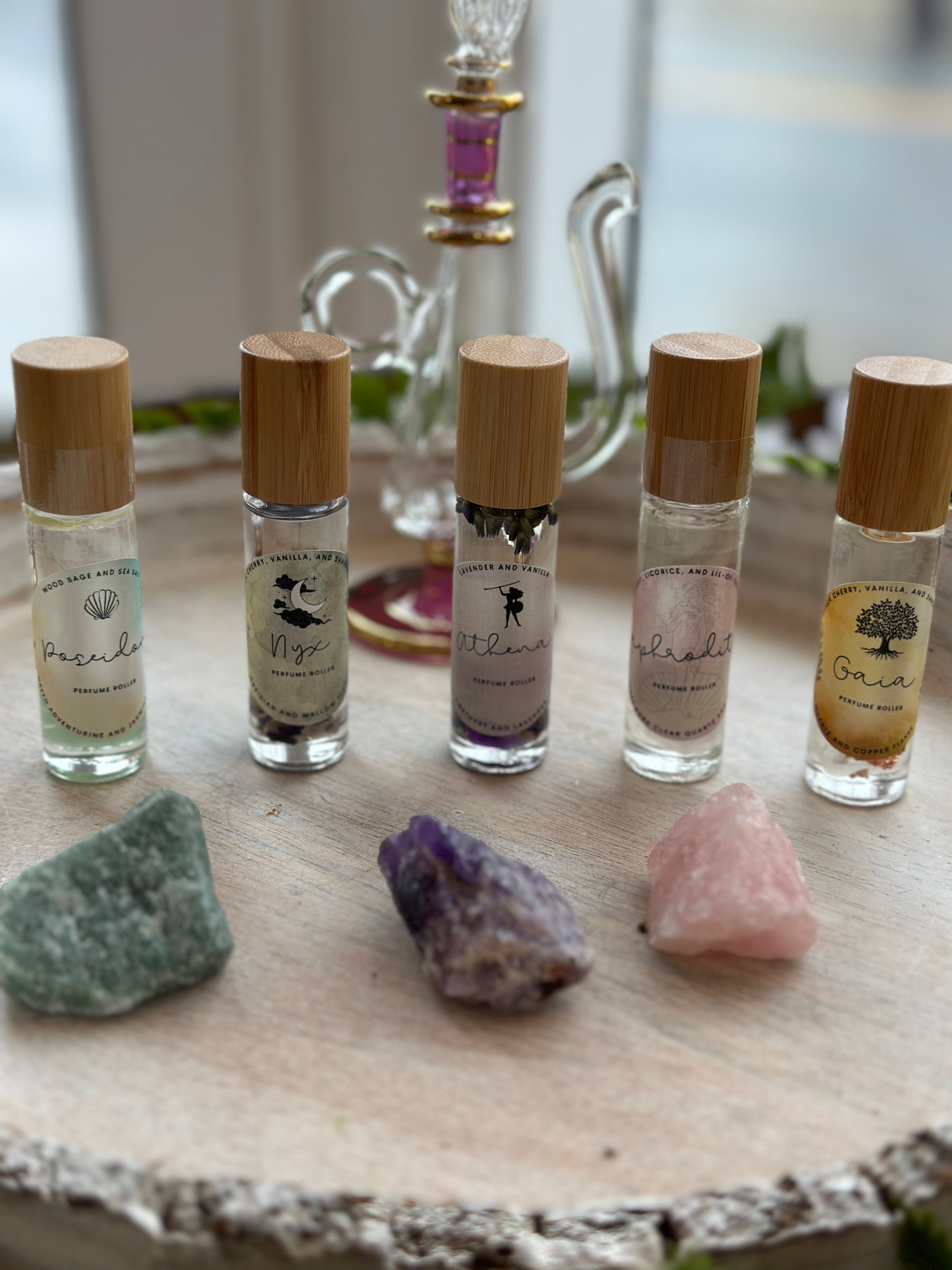 Sage & Stone Apothecary Goddess Perfume Roller for body care, featuring a sleek glass roller bottle with floral accents.