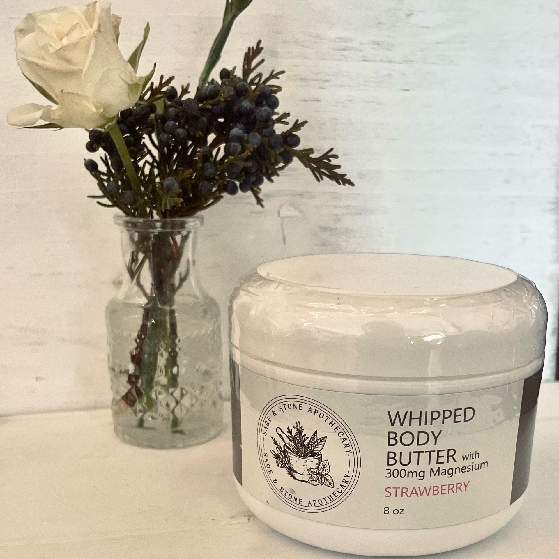 Sage & Stone Apothecary magnesium body butter in a jar, creamy texture for nourishing skin and promoting relaxation.