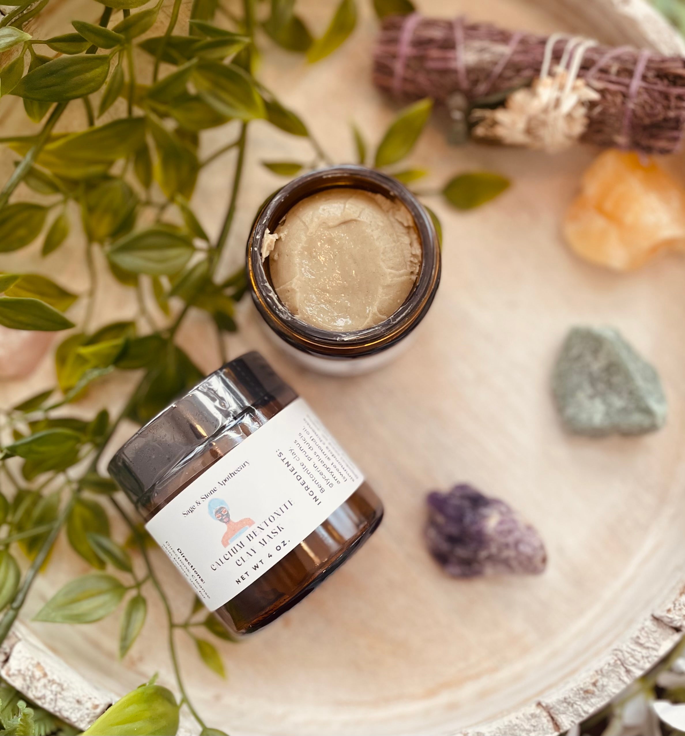 Calcium Bentonite Clay Mask by Sage & Stone Apothecary, showing a clay mask spread on skin for body care and wellness.