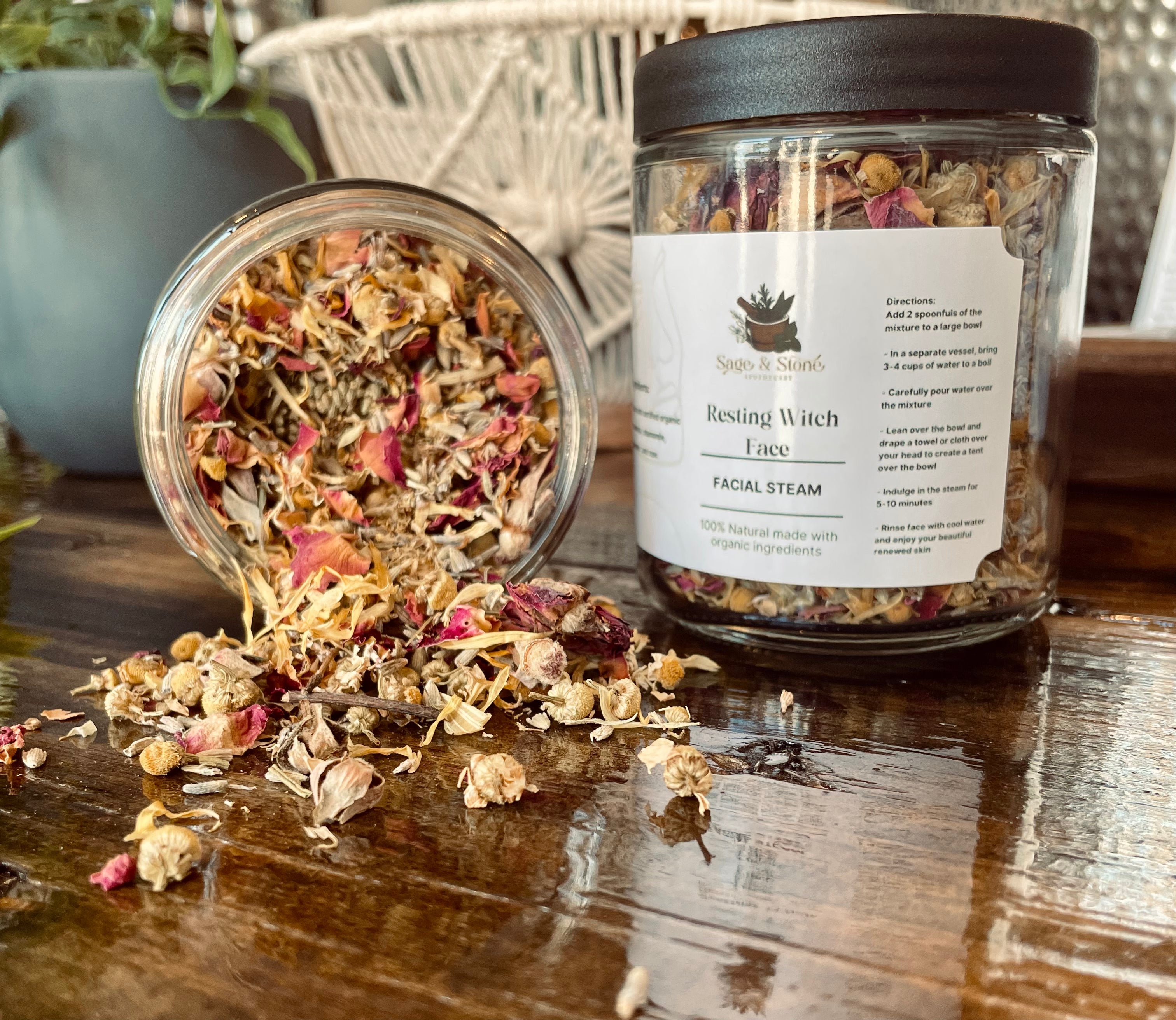 Sage & Stone Apothecary Resting Witch Face facial steam in a glass jar, promoting relaxation and skin wellness with herbal ingredients.