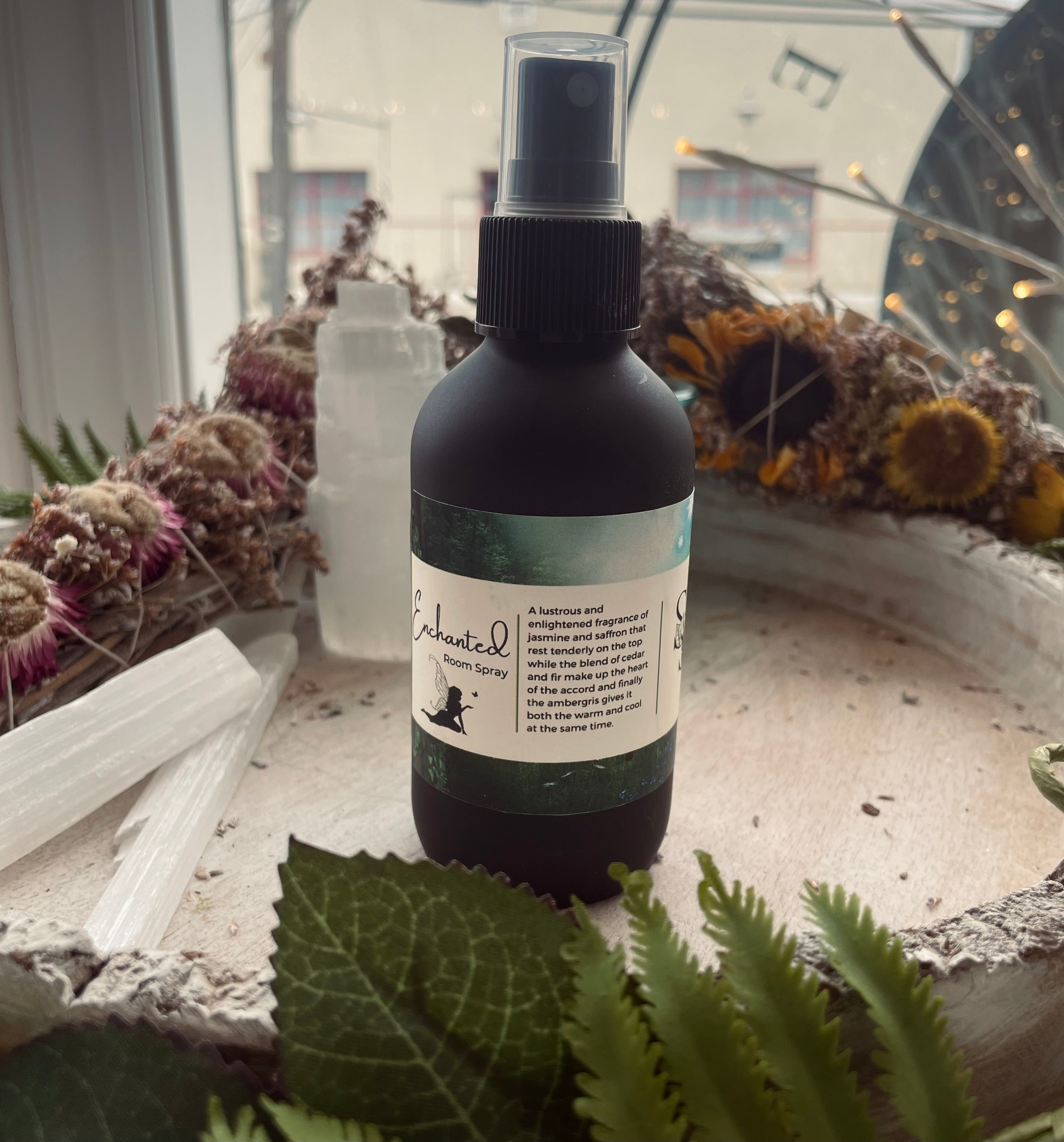 Sage & Stone Apothecary enchanted room spray bottle with floral and herbal labels, ready for home fragrance use.