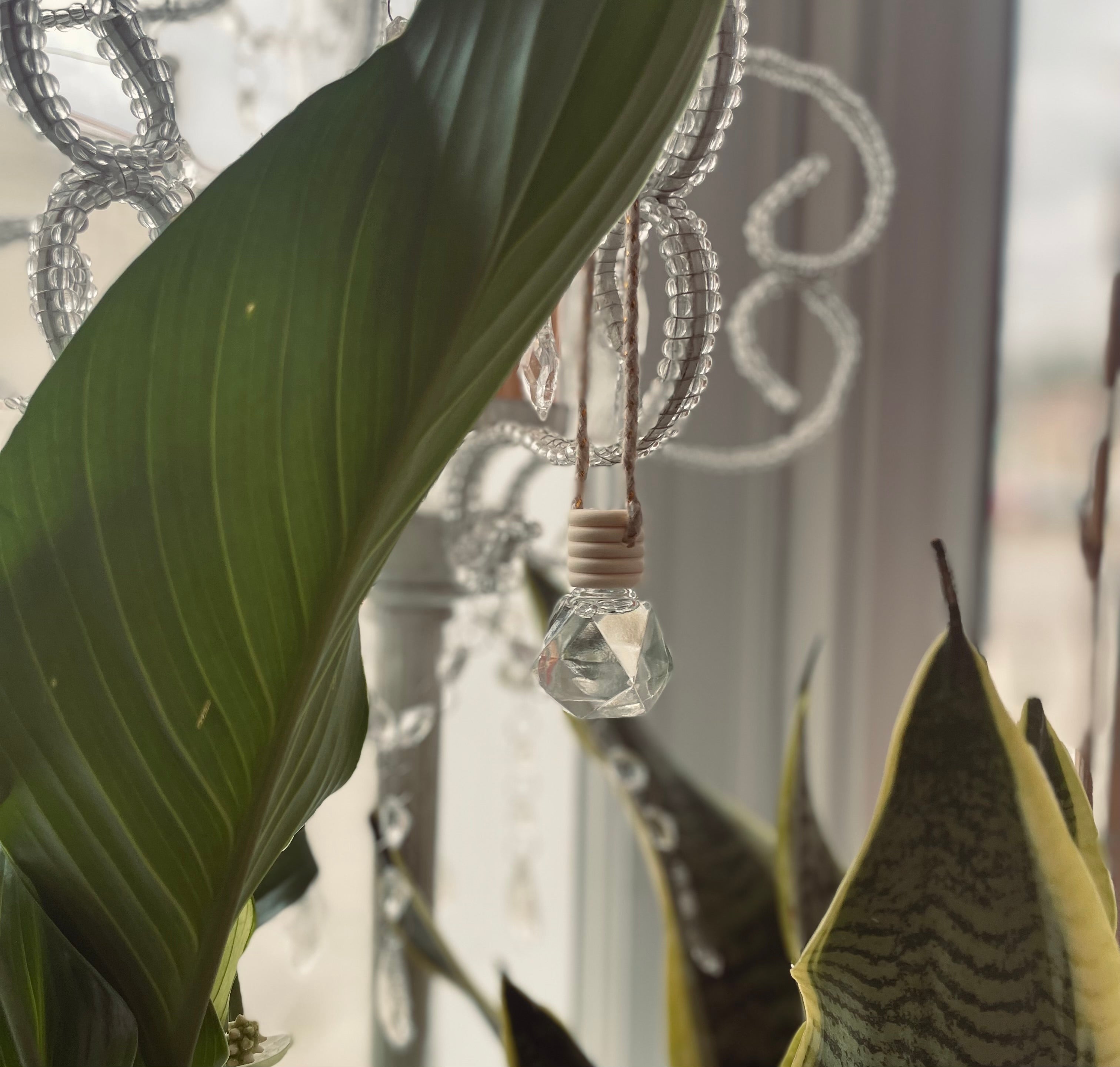 Vanilla Orchid car diffuser from Sage & Stone Apothecary featuring a sleek design and aromatic vanilla orchid fragrance.