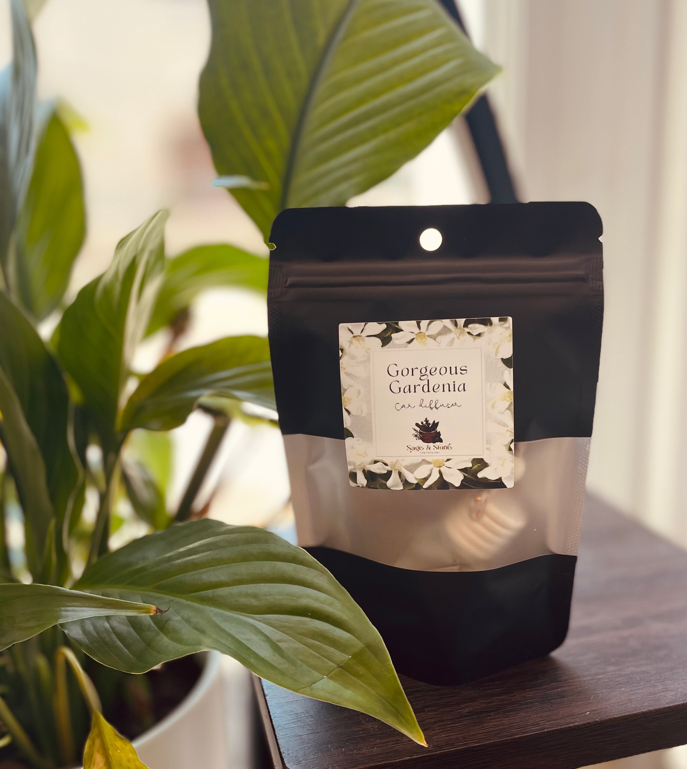 Sage & Stone Apothecary Gardenia Car Diffuser gift featuring a stylish design and a Gardenia scent for the automobile interior.