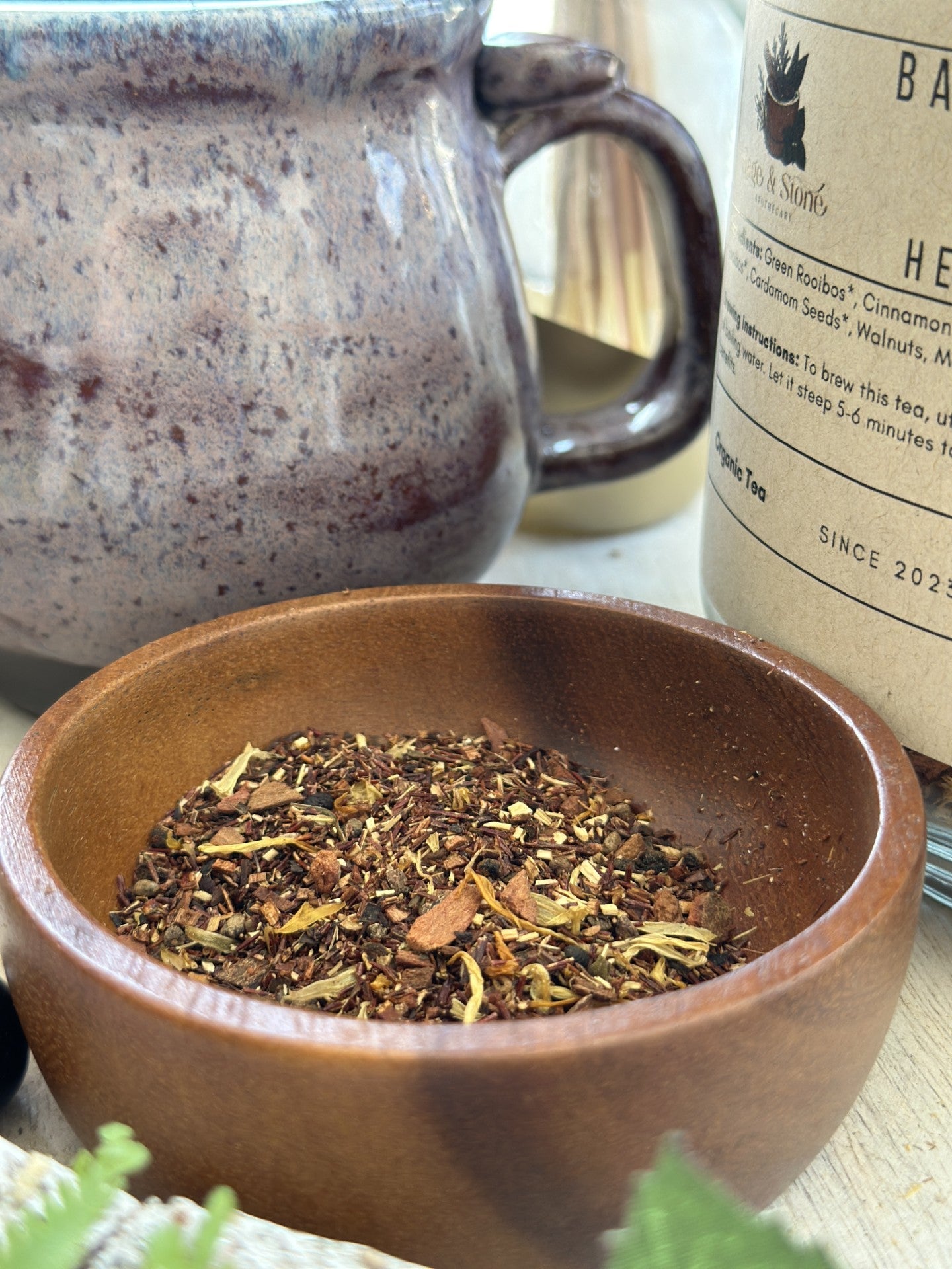 Sage & Stone Apothecary Banana Nut Bread tea in a teacup, featuring warm nutty and banana flavor with a comforting aroma.