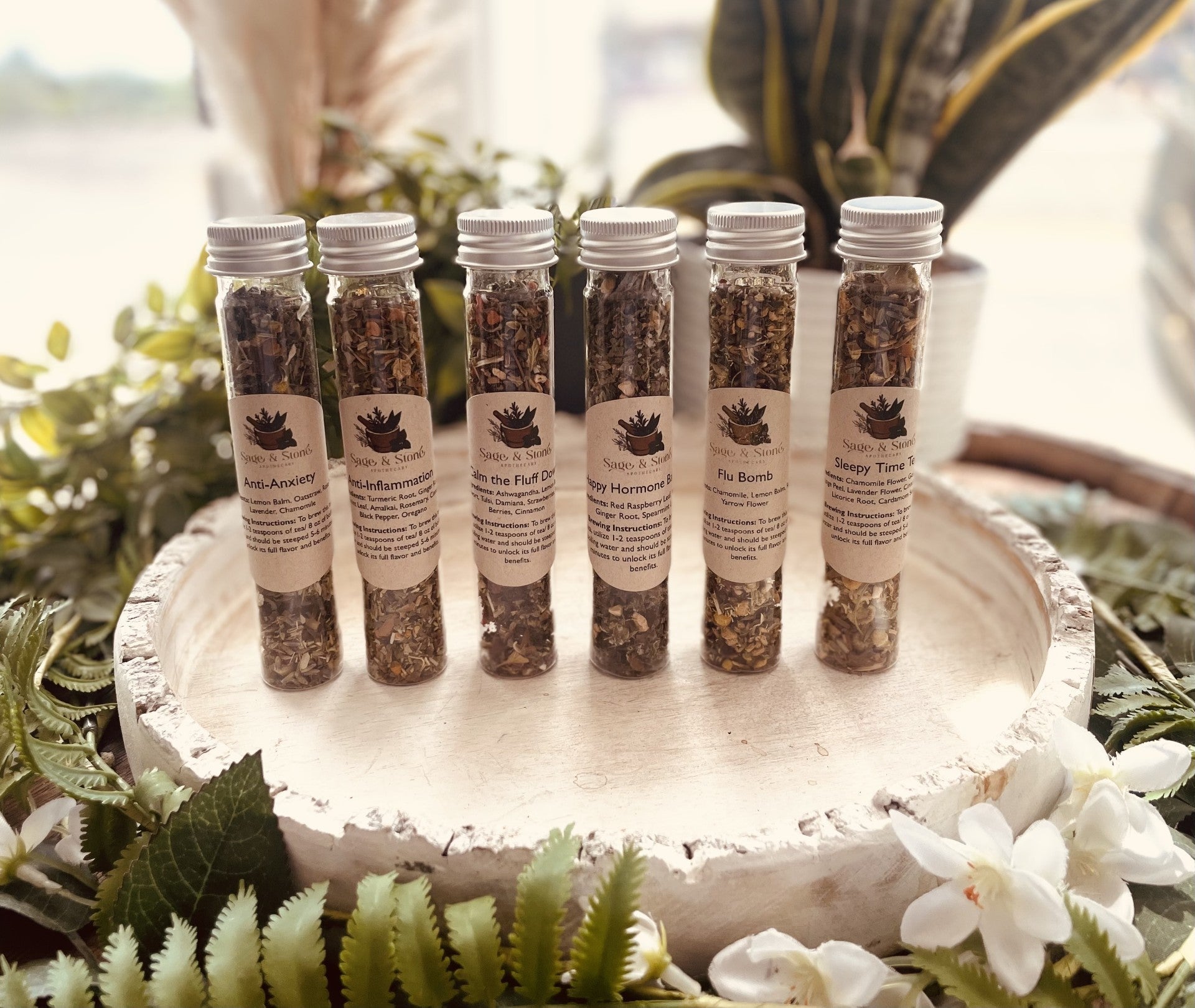 Sage & Stone Apothecary tea sampler set featuring assorted herbal infusions and medicinal teas in a decorative box.