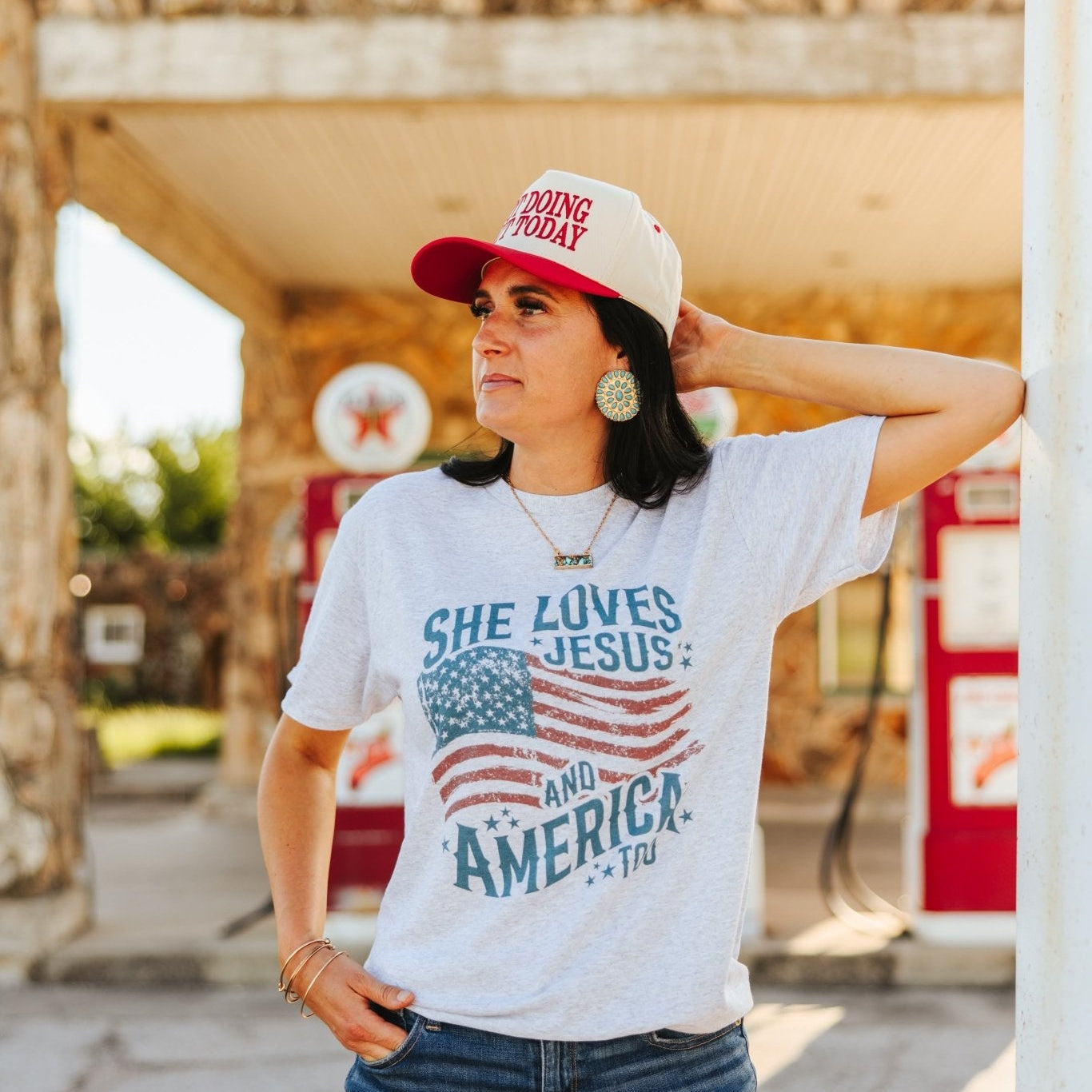 Wild Junkie She Loves Jesus & America graphic tee featuring a patriotic design and inspirational message on a casual T-shirt.