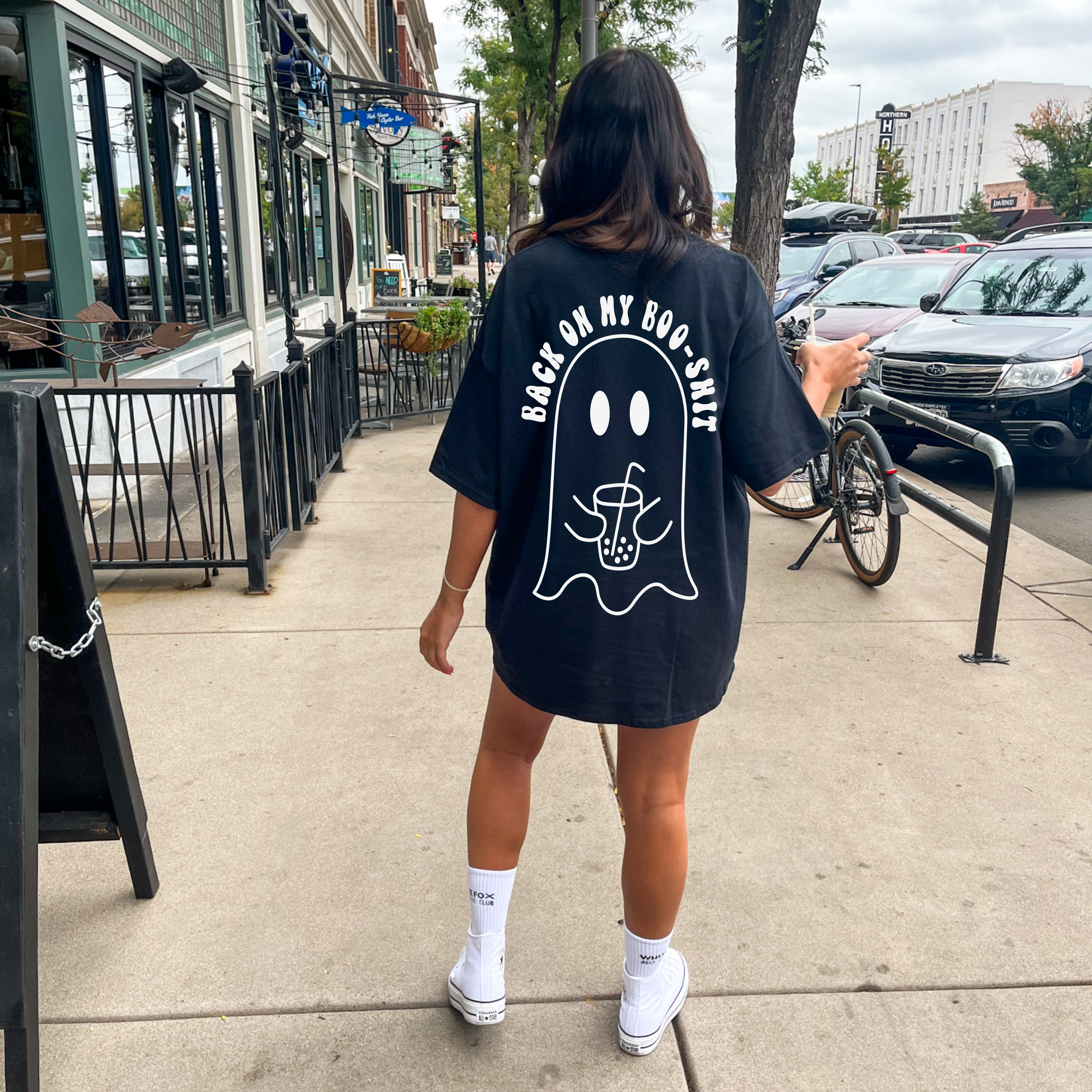 Black graphic tee from Shop Karma Tees featuring bold "Back on my Boo Shit" print on the back. Casual streetwear style.
