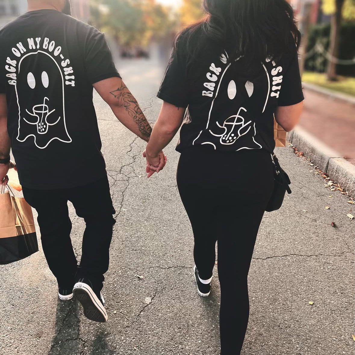 Black graphic t-shirt from Shop Karma Tees with "Back on my Boo Shit" design, casual fit, and printed front view.