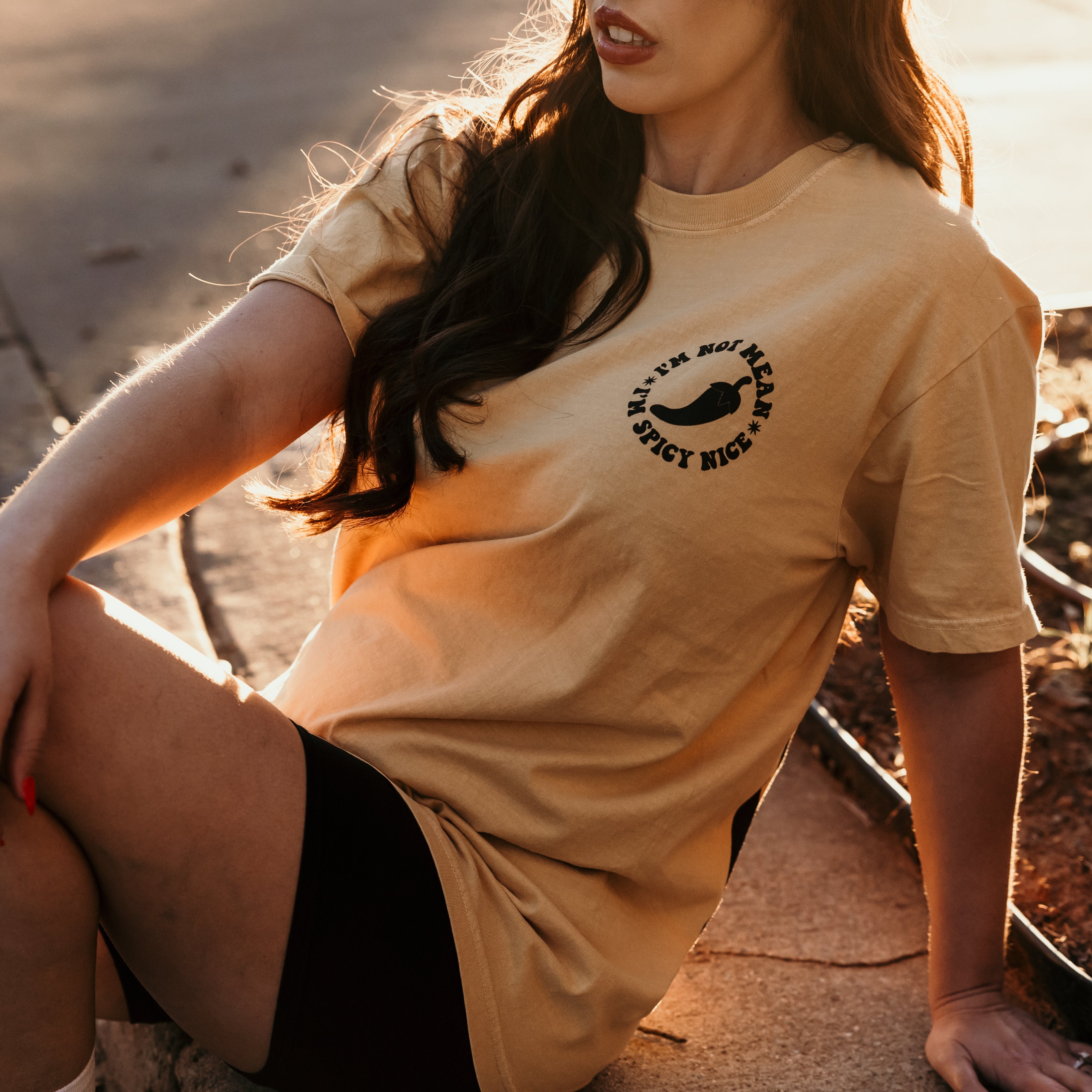 Spicy Nice graphic t-shirt by Shop Karma Tees featuring bold lettering and colorful design on a casual cotton tee.