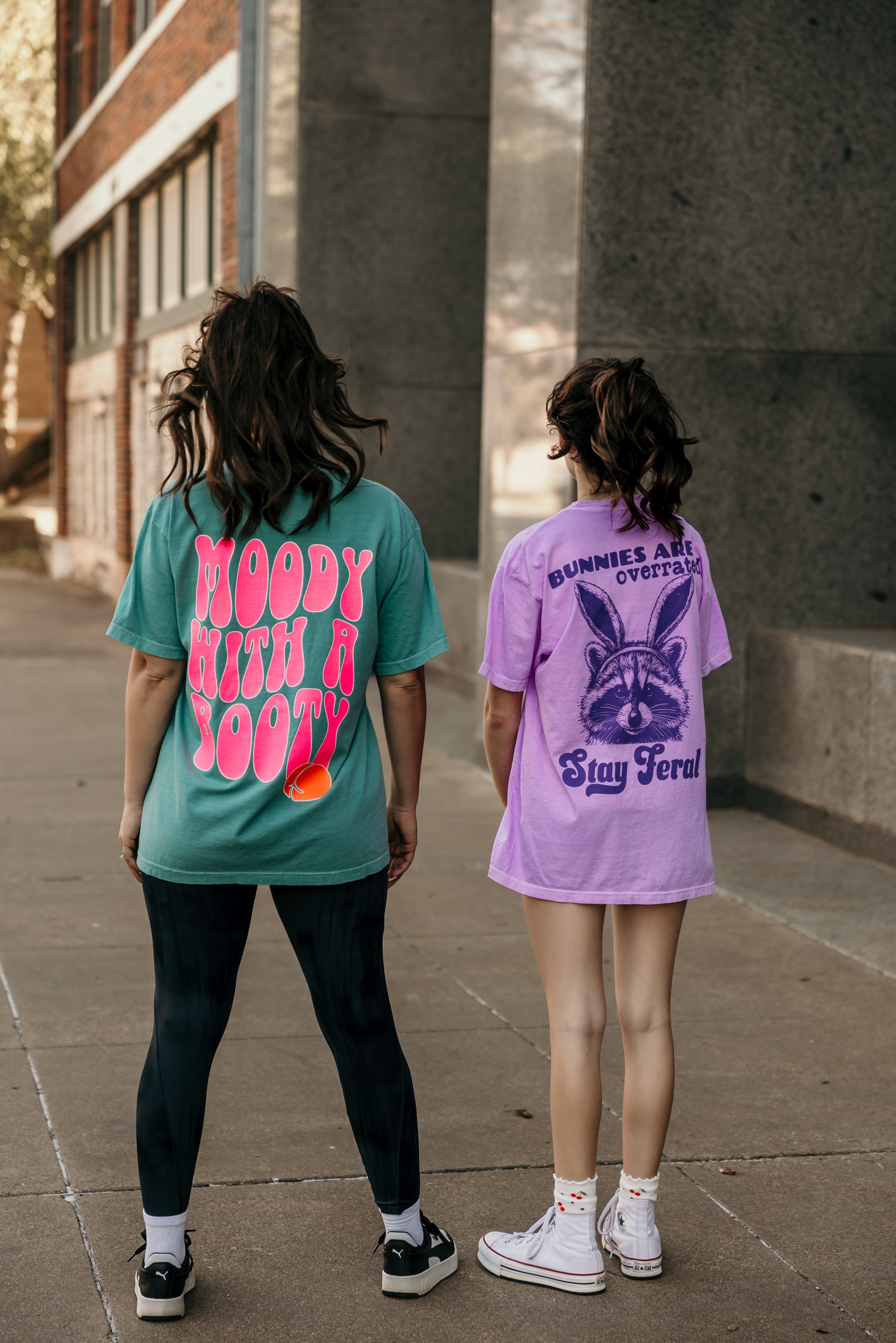 Moody with a Booty graphic T-shirt from Shop Karma Tees, featuring bold print on a casual, comfortable cotton tee.