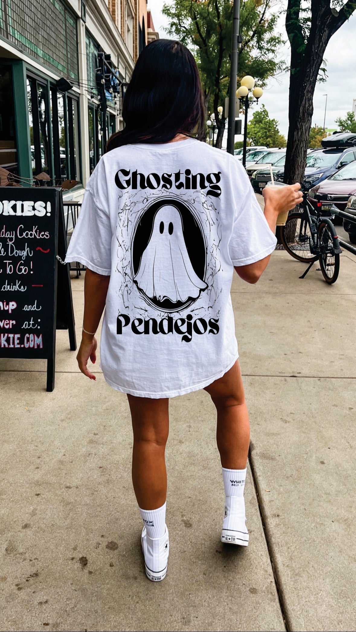 Men's Ghosting Pendejos graphic T-shirt featuring bold text and design, displayed on a plain background.