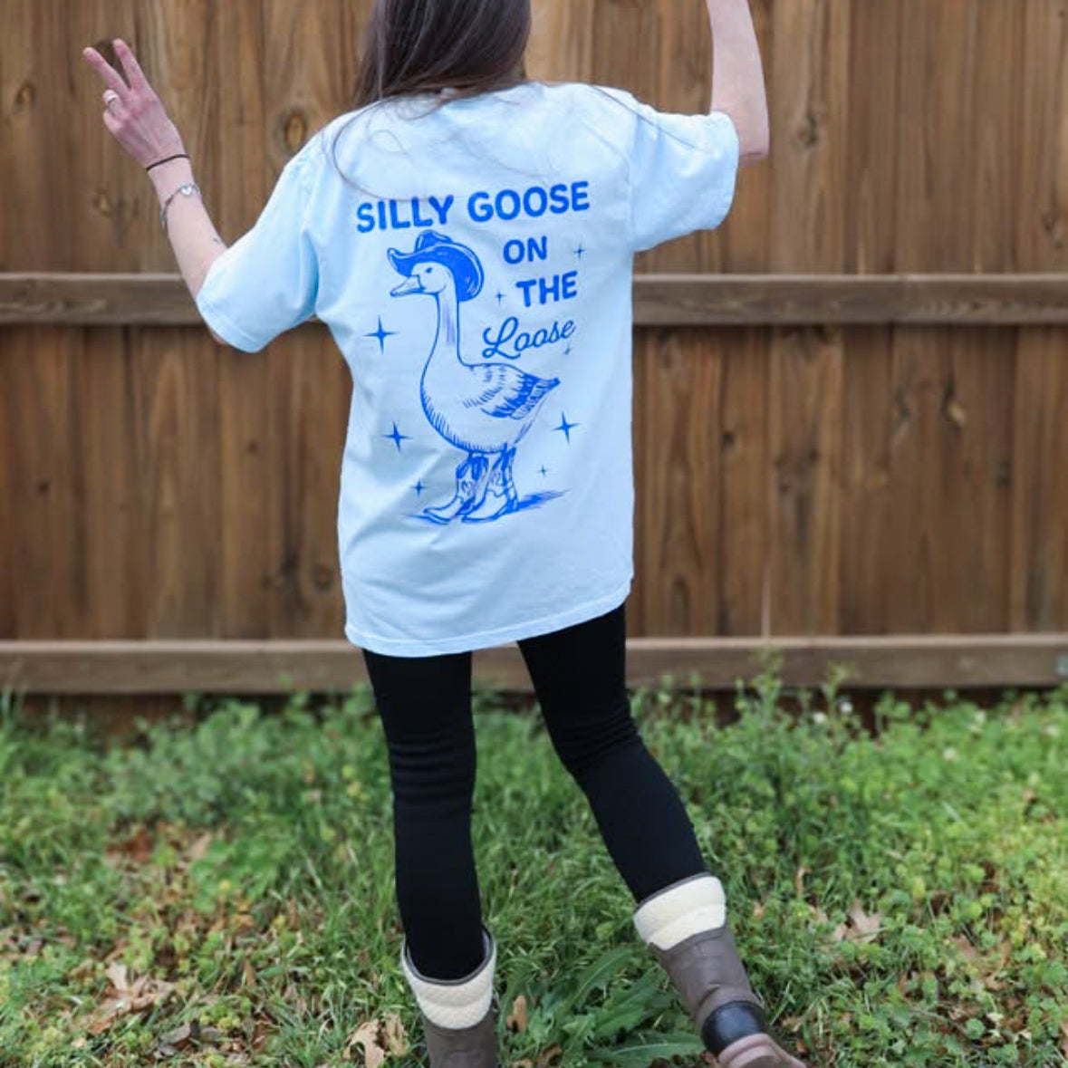Silly Goose on the Loose graphic tee by Shop Karma Tees featuring a playful goose illustration on a casual crewneck or t-shirt