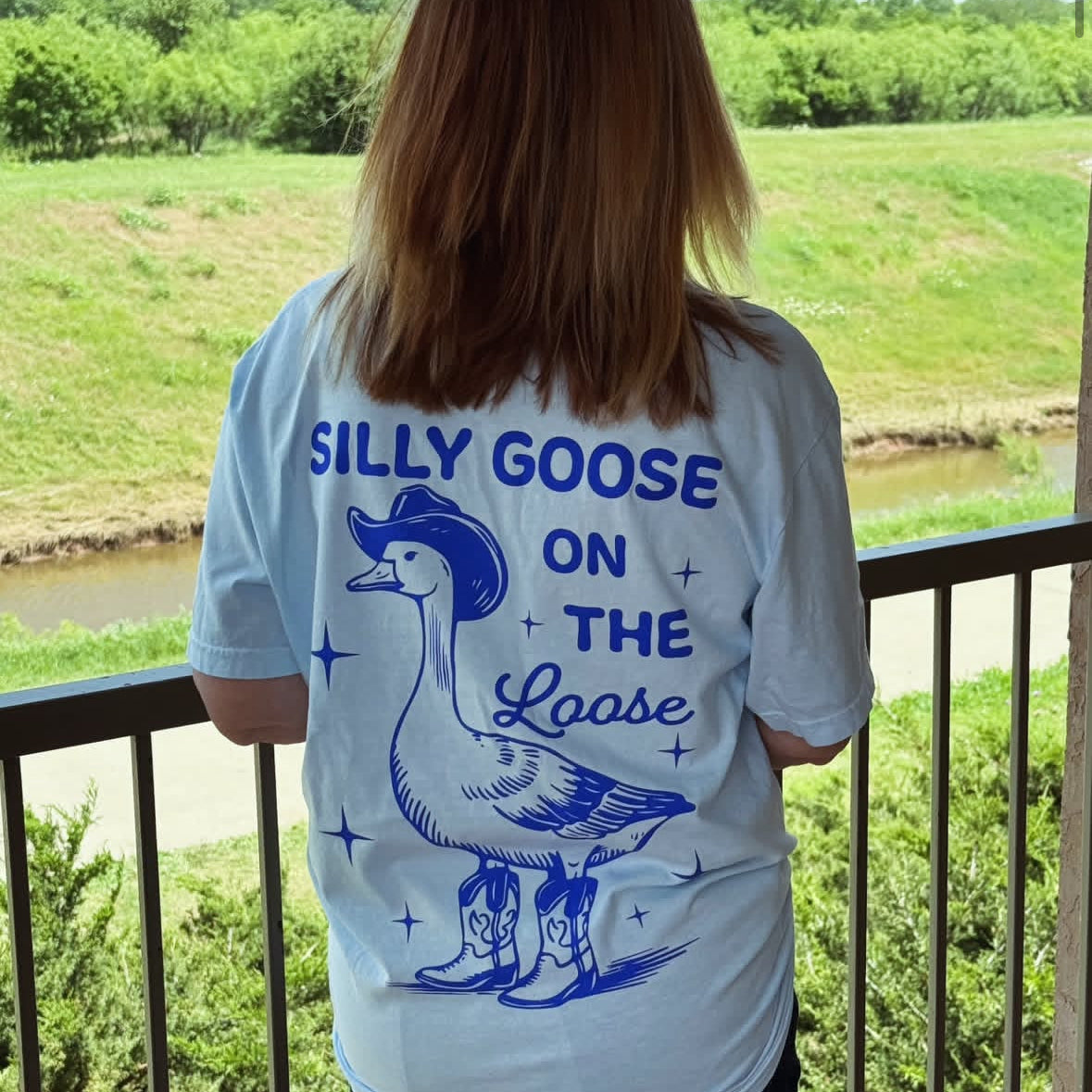 Silly Goose on the Loose graphic tee featuring a playful goose illustration, casual crewneck, and colorful design by Shop Karma Tees