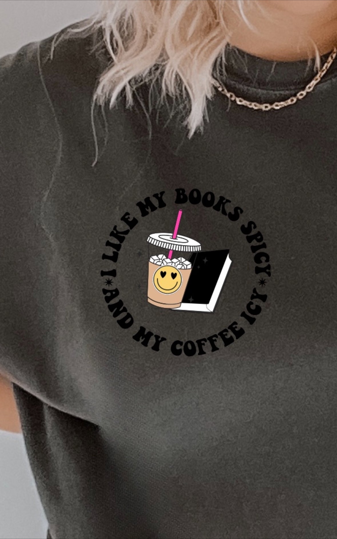 Spicy Books graphic T-shirt by Shop Karma Tees featuring a colorful book-themed design on a casual cotton tee.