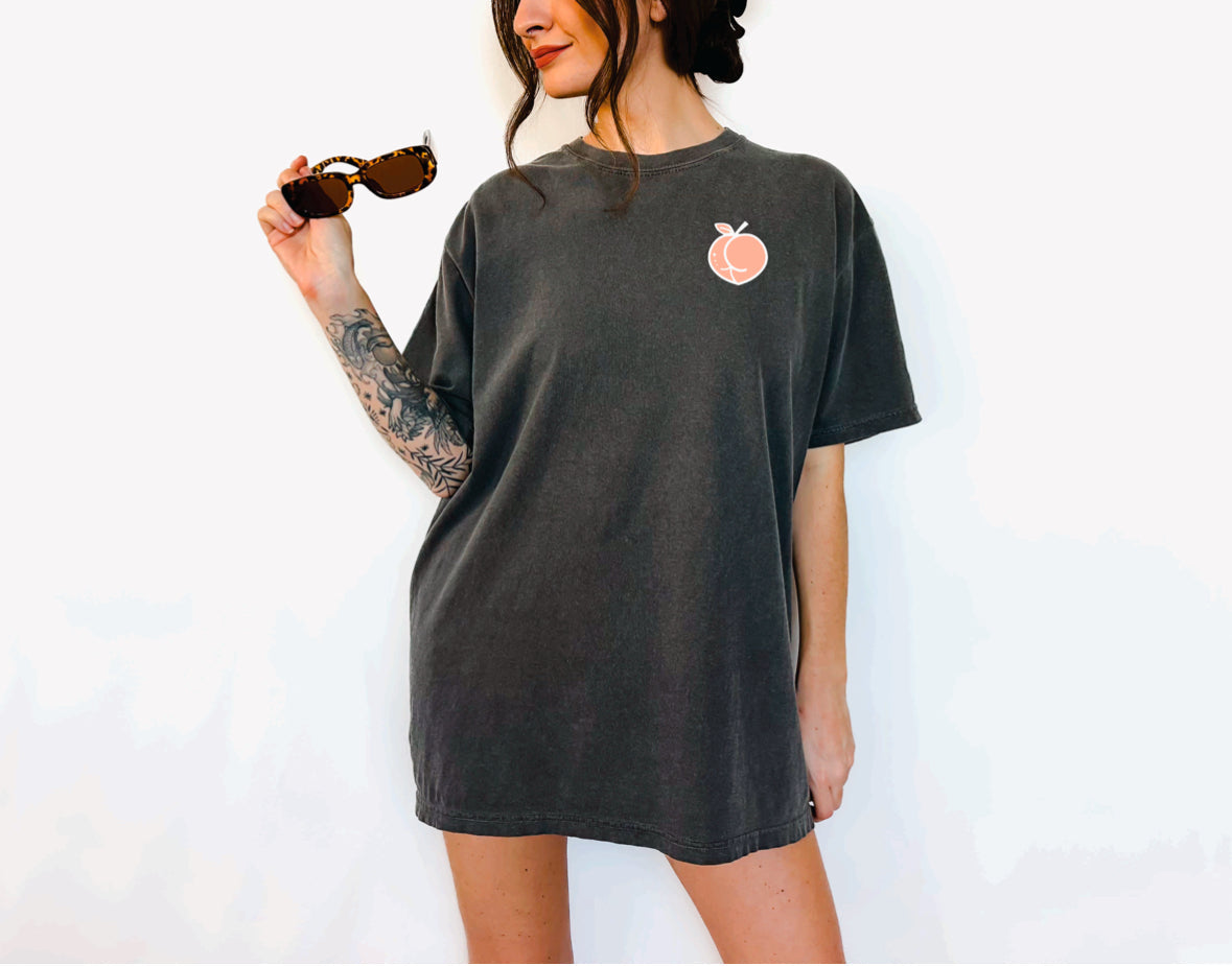 Thick Thighs Save Lives graphic T-shirt by Shop Karma Tees, featuring bold text and casual fit on a cotton tee.