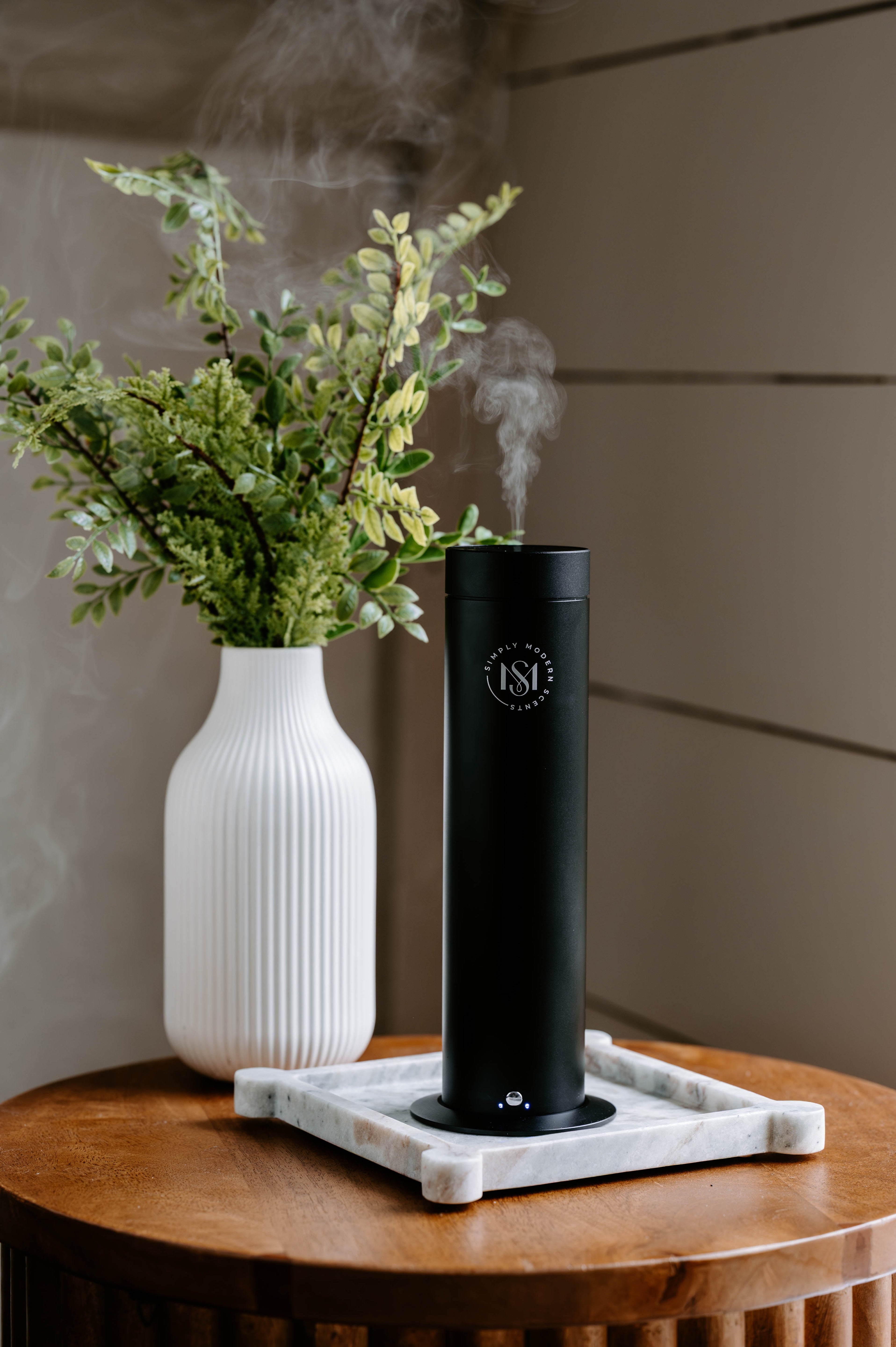 Simply Modern Scents luxury electric home diffuser with a 2 oz diffuser oil bottle, stylish design for elegant home fragrance.