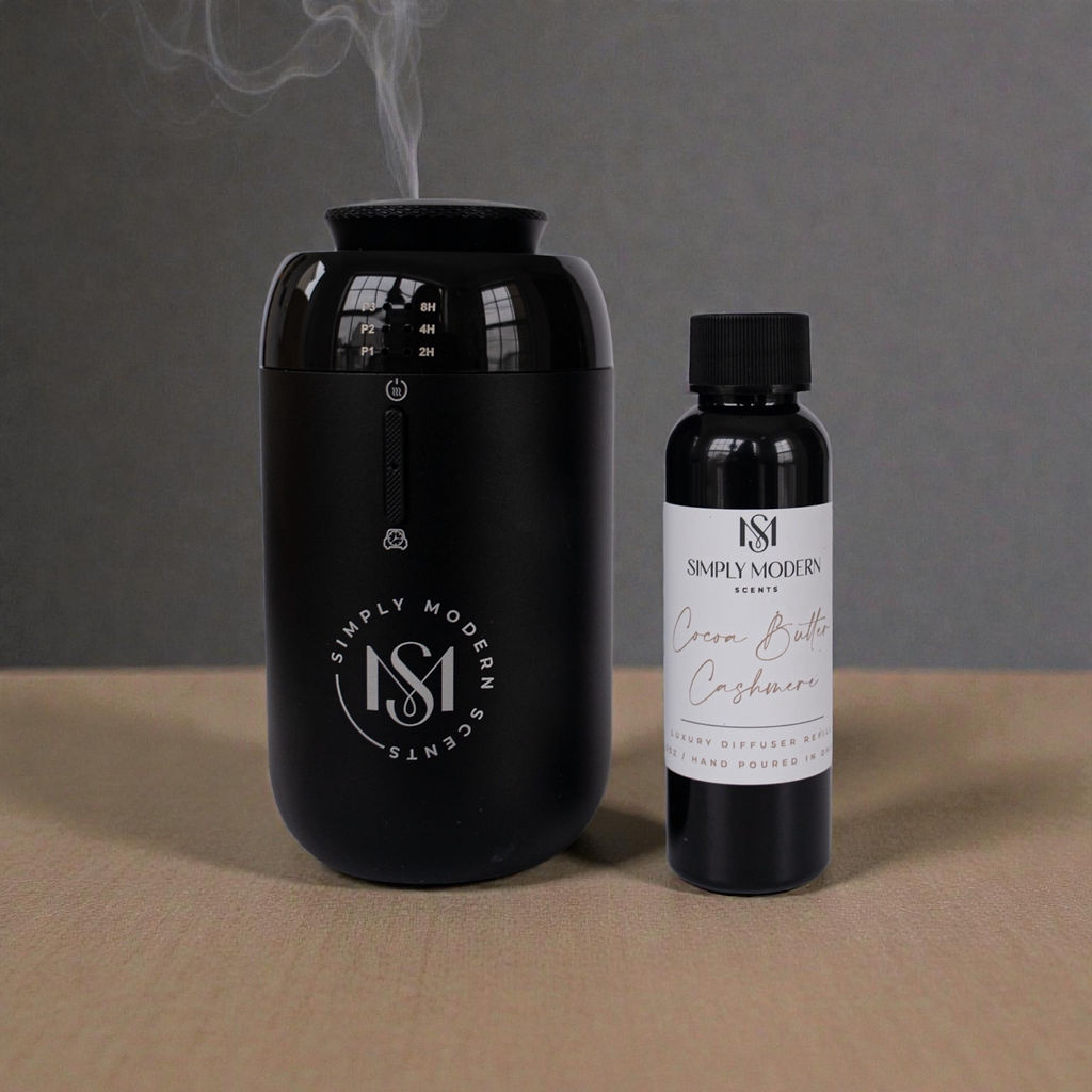 Luxury car diffuser from Simply Modern Scents with a 2 oz diffuser oil bottle, designed for stylish vehicle scenting.