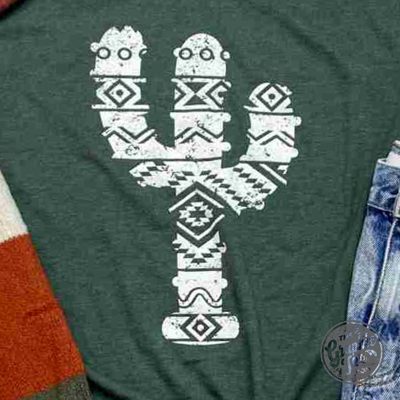 Southwest Cactus Unisex Graphic Tee by The Graphic Tee, featuring a vibrant cactus design on a casual short-sleeve t-shirt.