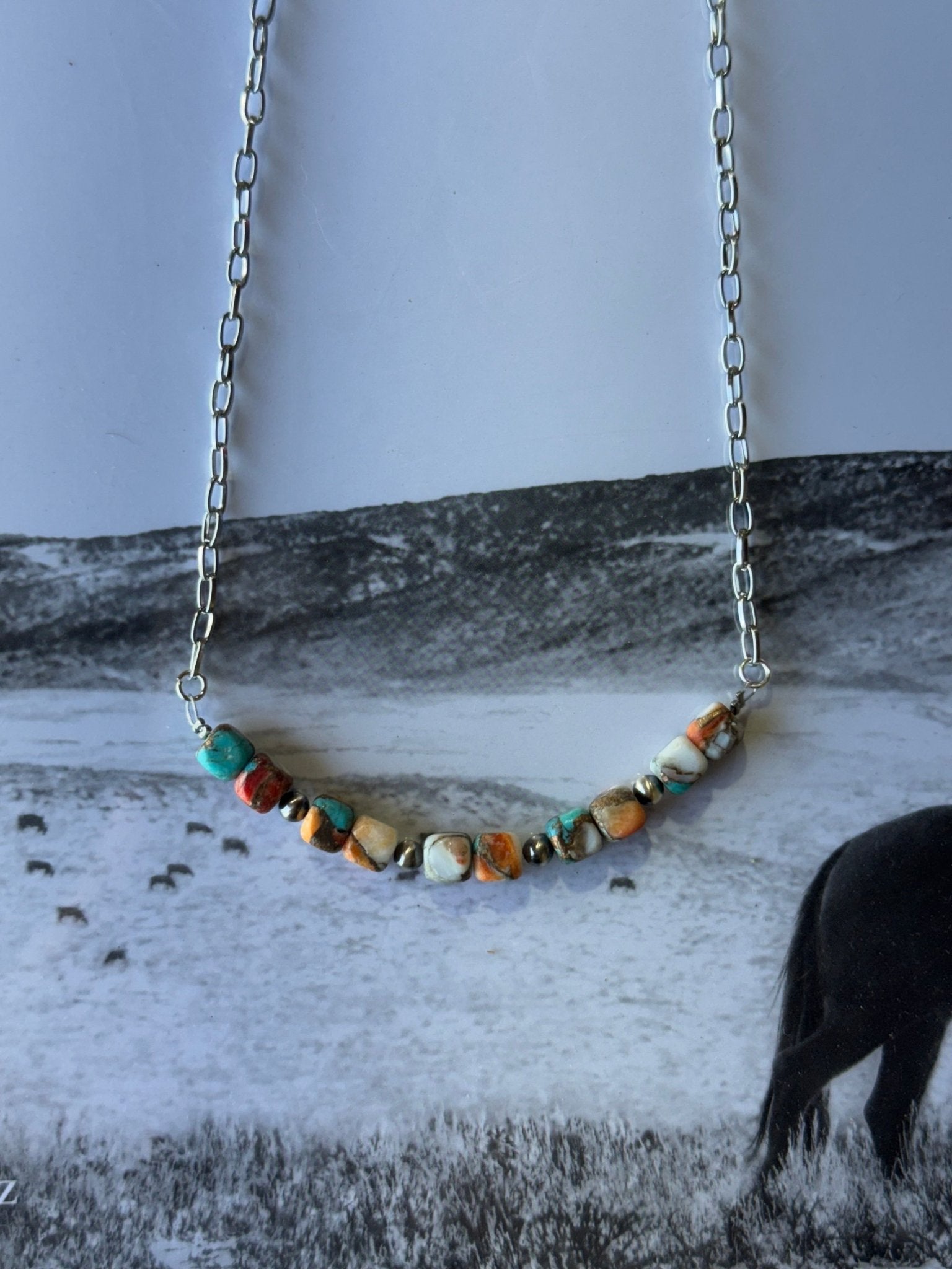 Spiny oyster turquoise beaded chain necklace by Wild Junkie featuring vibrant, handcrafted beads on a delicate chain.