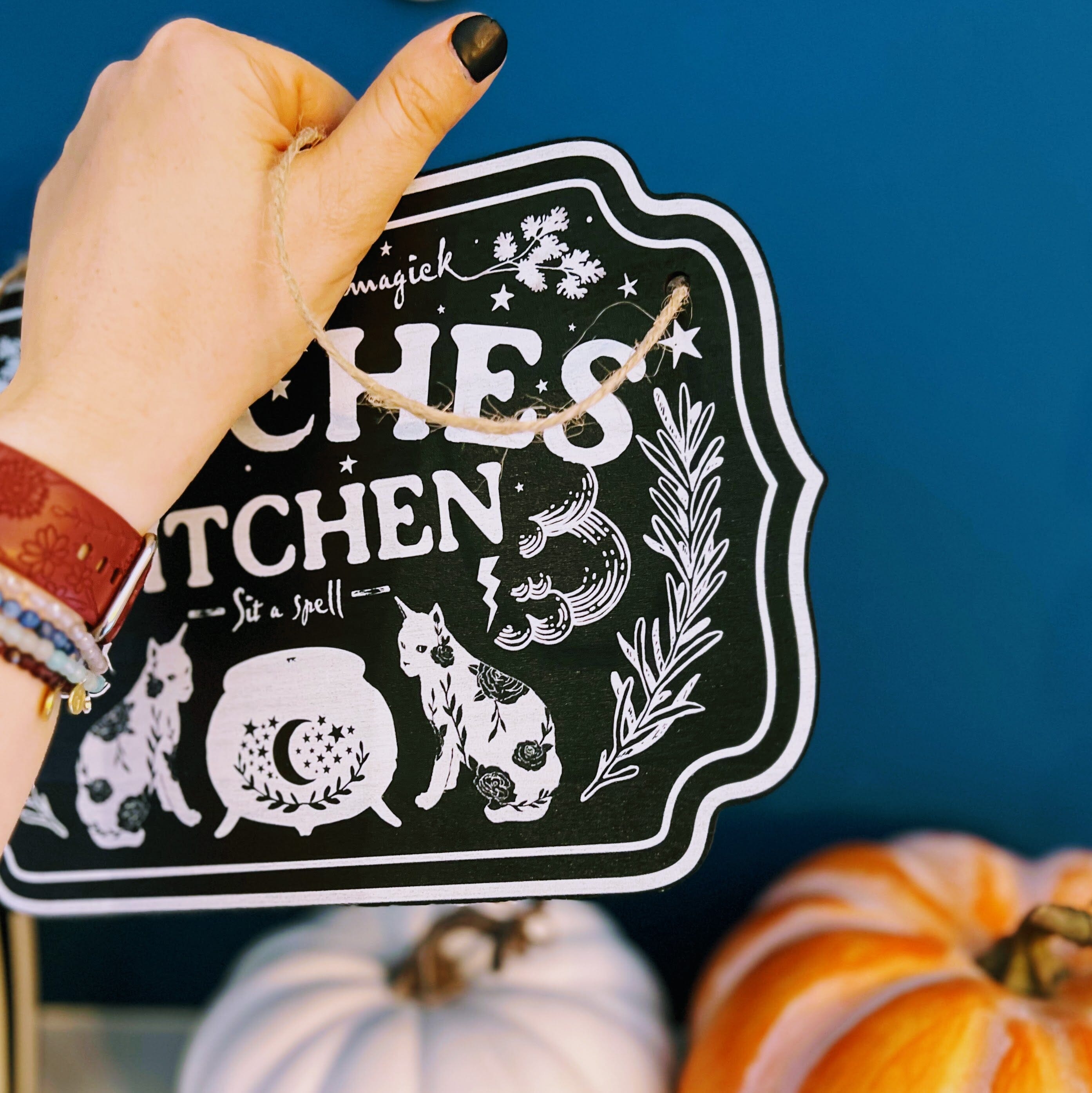 Wooden witchy décor sign by Spirit Nest with spooky lettering, perfect for home Halloween or witch-themed kitchen decor.
