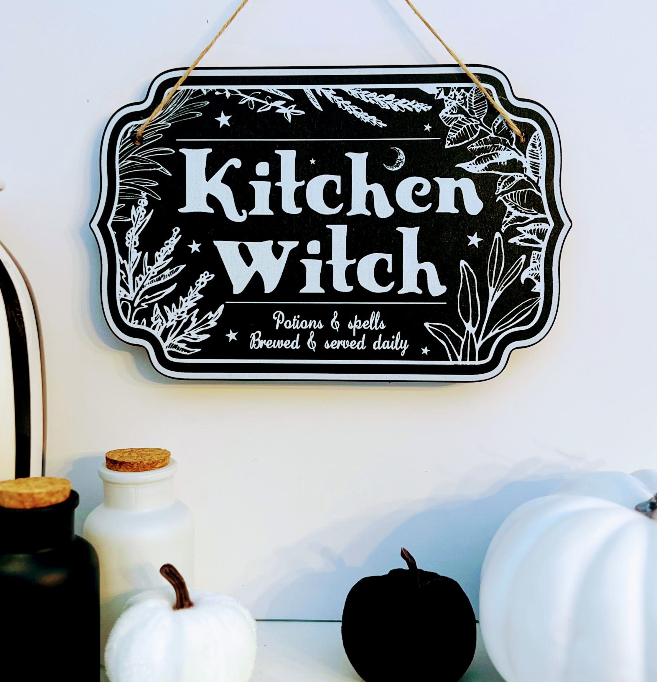 Wooden witchy décor sign for home from Spirit Nest with mystical text, perfect for adding a spooky touch to your kitchen or space.