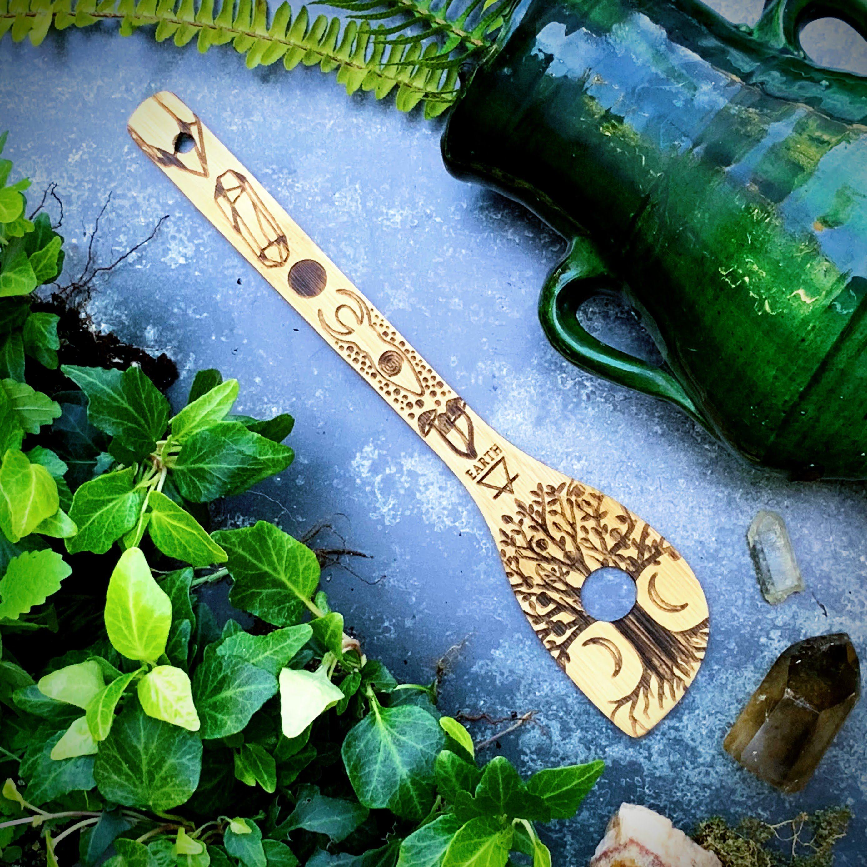 Spirit Nest 5 Elements Bamboo Large Kitchen Utensils Set includes spatulas, spoons, and turners in natural bamboo for cooking.