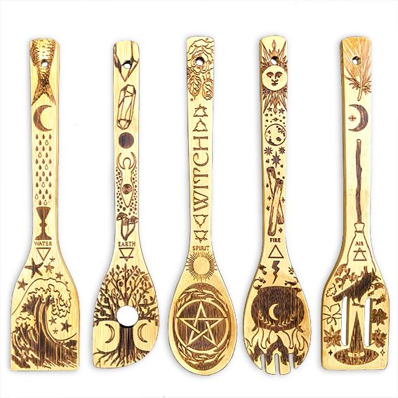 Spirit Nest 5 Elements Bamboo Kitchen Utensils Set with large spatulas, spoons, and ladles for cooking and serving.