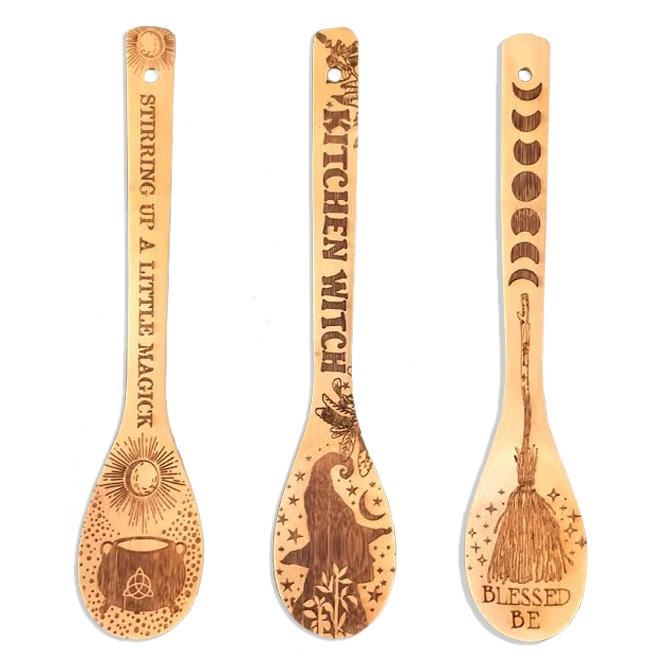Set of three witchy bamboo wooden spoons for kitchen use by Spirit Nest, featuring mystical engraved designs.