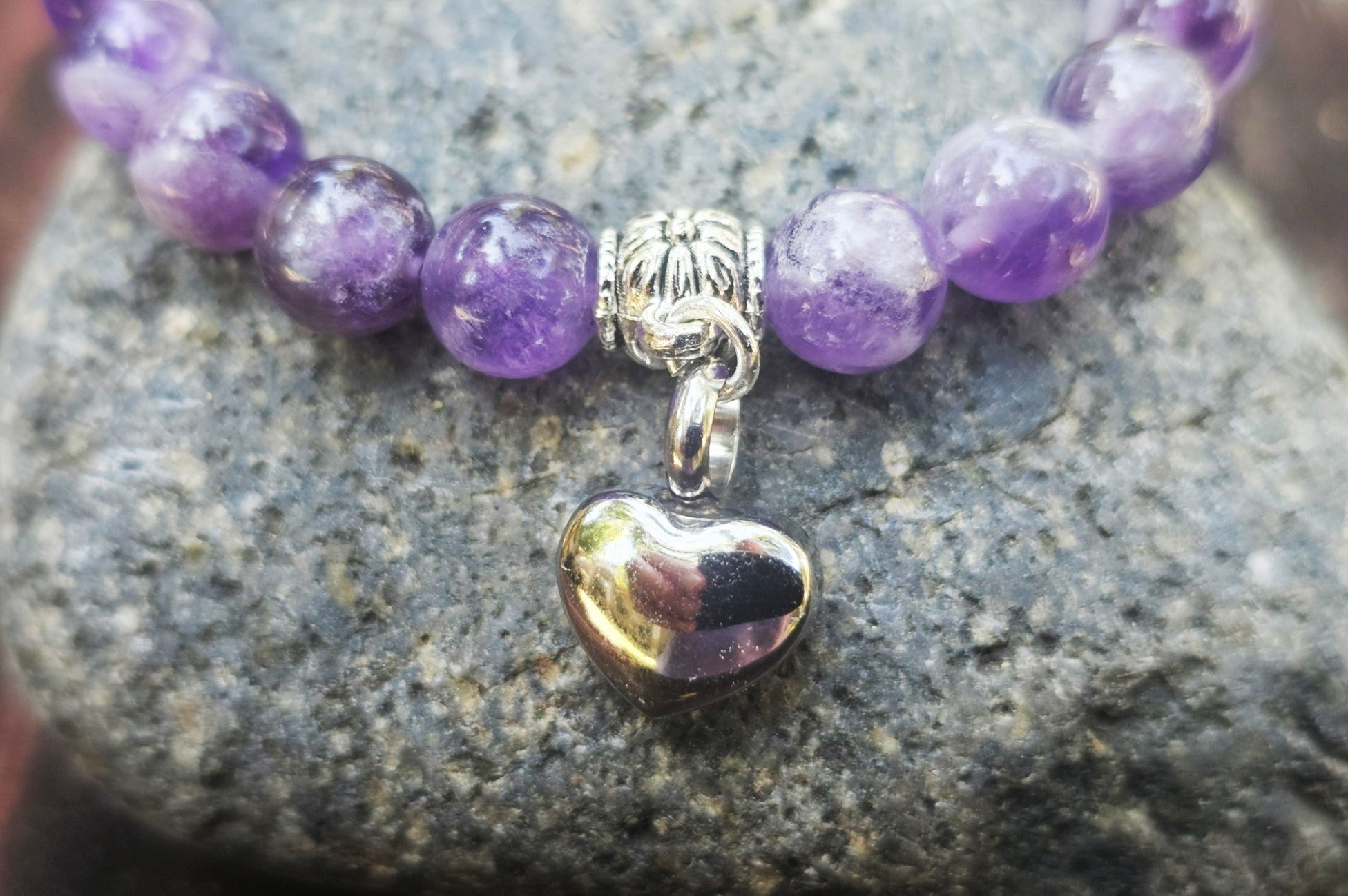 Silver Dogtooth Amethyst Urn Bracelet by Spirit Pieces, cremation jewelry bracelet with a petite design and amethyst stone accents.