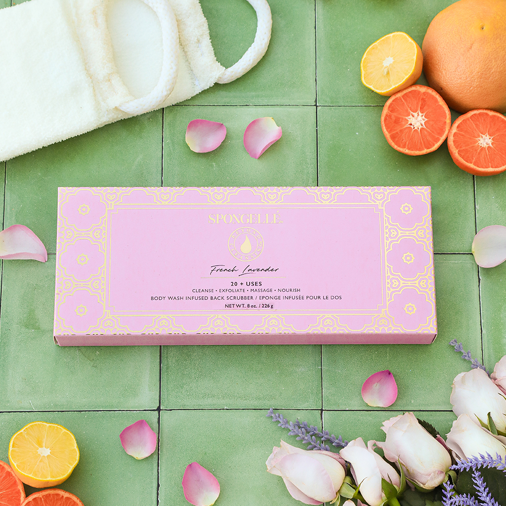 Spongellé French Lavender Body Wash Infused Back Buffer showing the textured back scrubber with lavender scent and packaging.