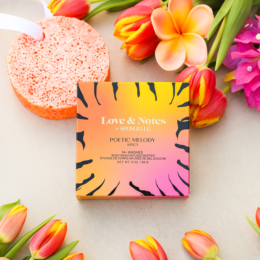 Spongellé Poetic Melody Love & Notes Body Buffer, a body wash infused sponge with floral and musky scent details.