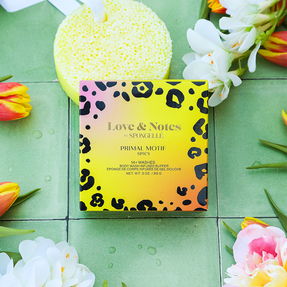Spongellé Love & Notes Primal Motif Body Wash Infused Buffer with floral design and textured surface for cleansing and exfoliating skin.