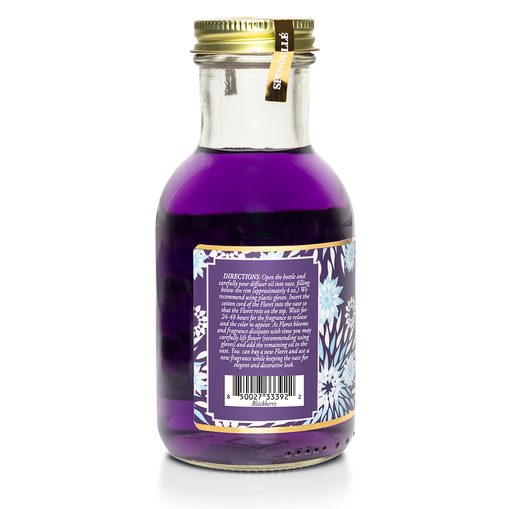 Blackberry diffuser oil from Spongellé's Private Reserve Collection, fragrant home scent in a glass bottle with a reed diffuser.