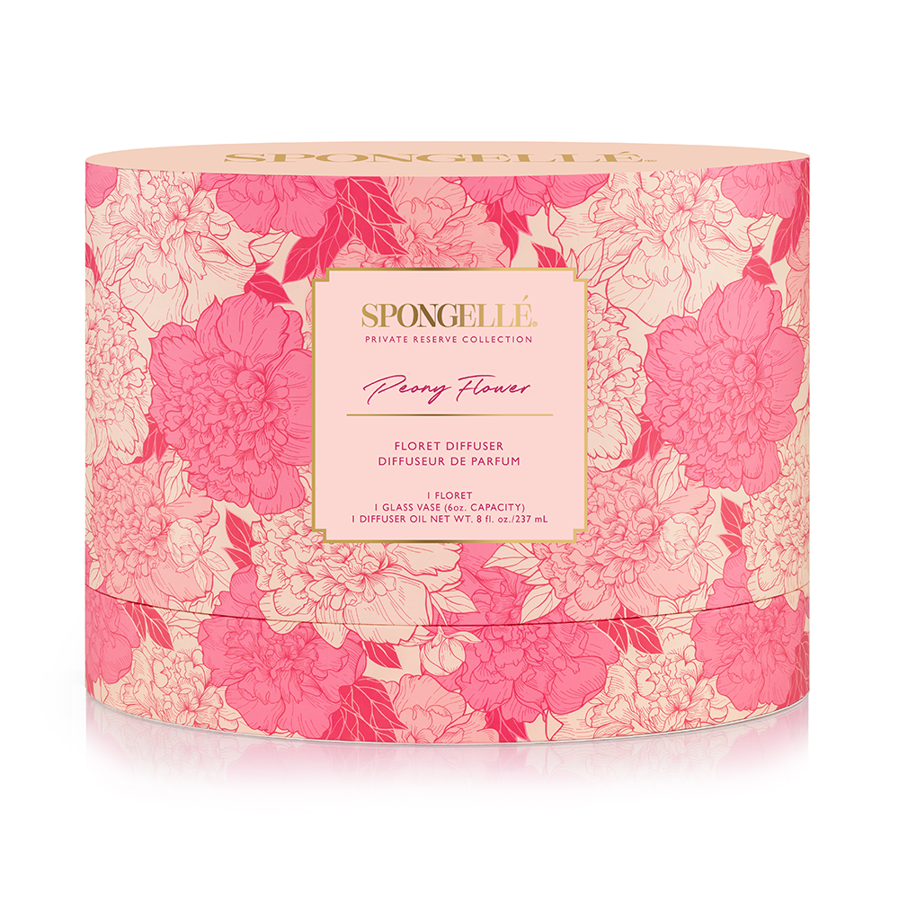 Spongellé Private Reserve Peony Flower home fragrance diffuser with a decorative glass bottle and floral accents.