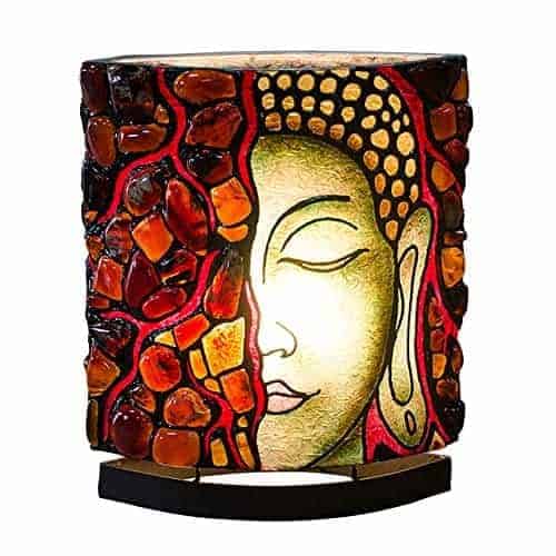 Sumatra Amber Buddha meditation face table lamp by Starborn Creations with LED bulb, showcasing a serene Buddha face design.