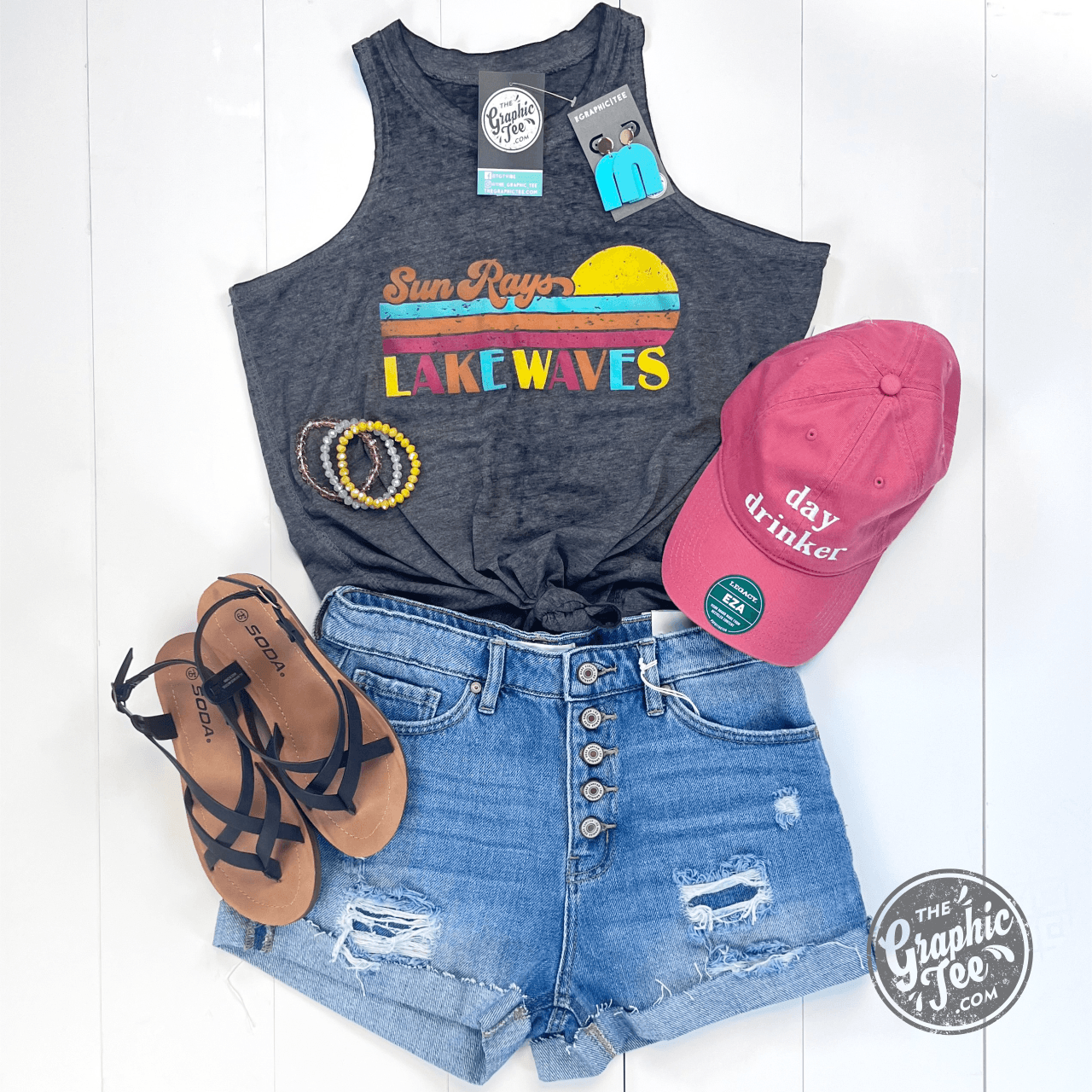 Graphic tank top for women featuring sun rays and lake wave design by The Graphic Tee.