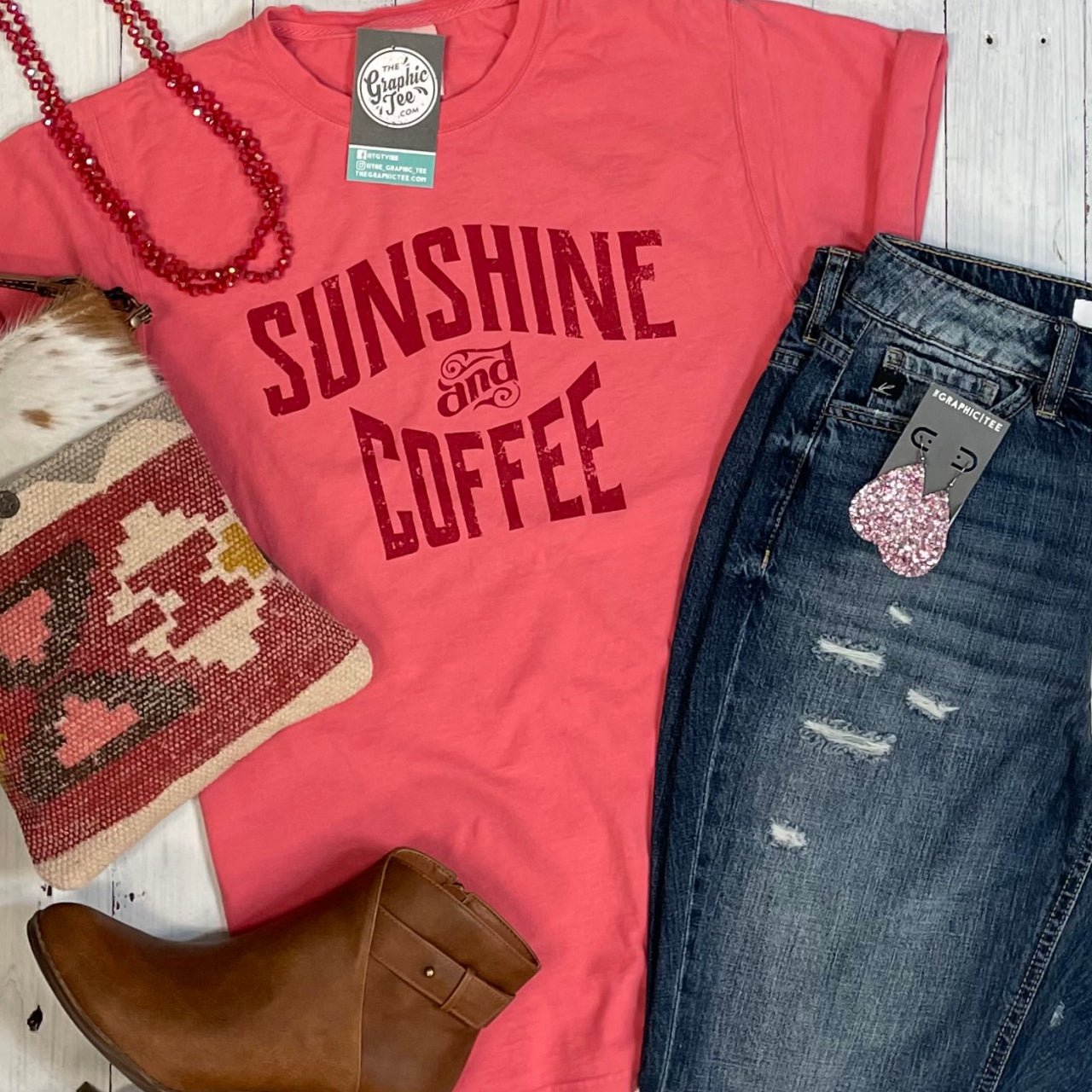 Sunshine and Coffee unisex short sleeve graphic tee by The Graphic Tee, featuring a vibrant sunny and coffee-themed design.