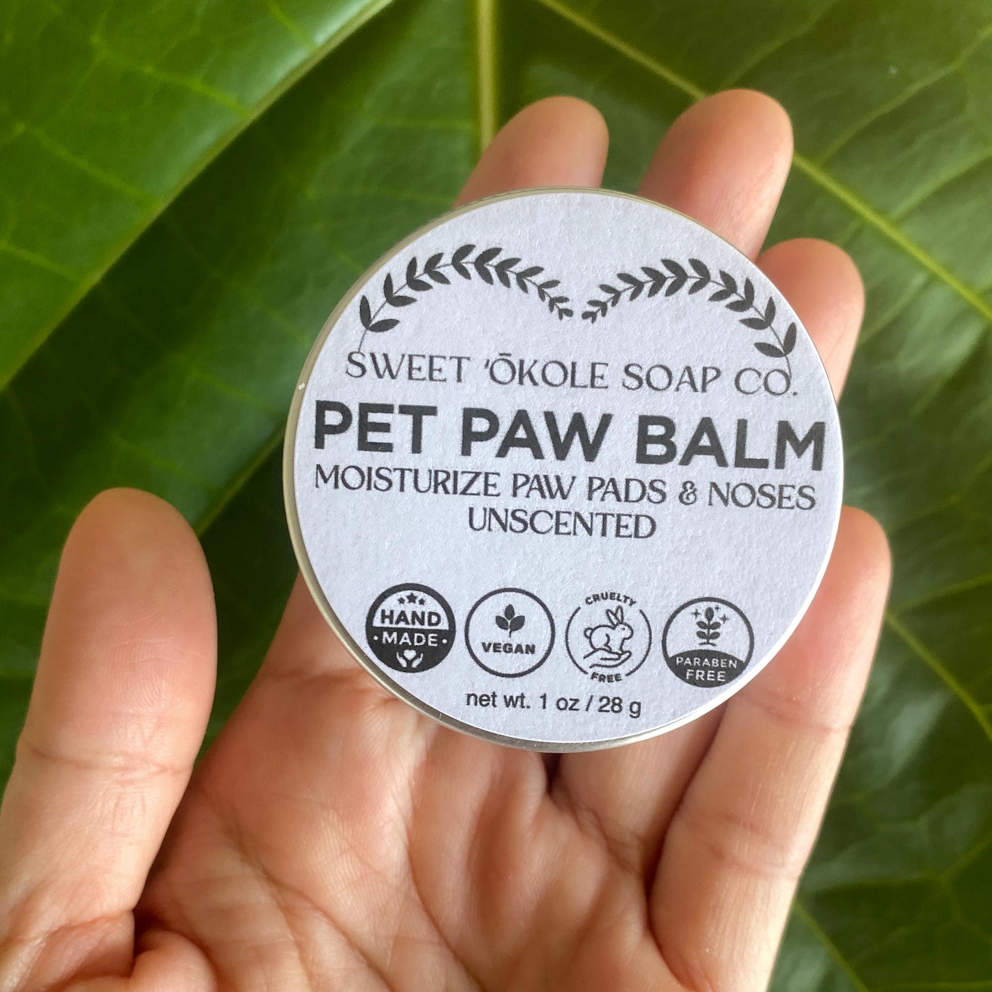 Natural Pet Paw Balm by Sweet ʻŌkole Soap, moisturizing paw salve for dogs and cats, showing the balm jar with paw print label.
