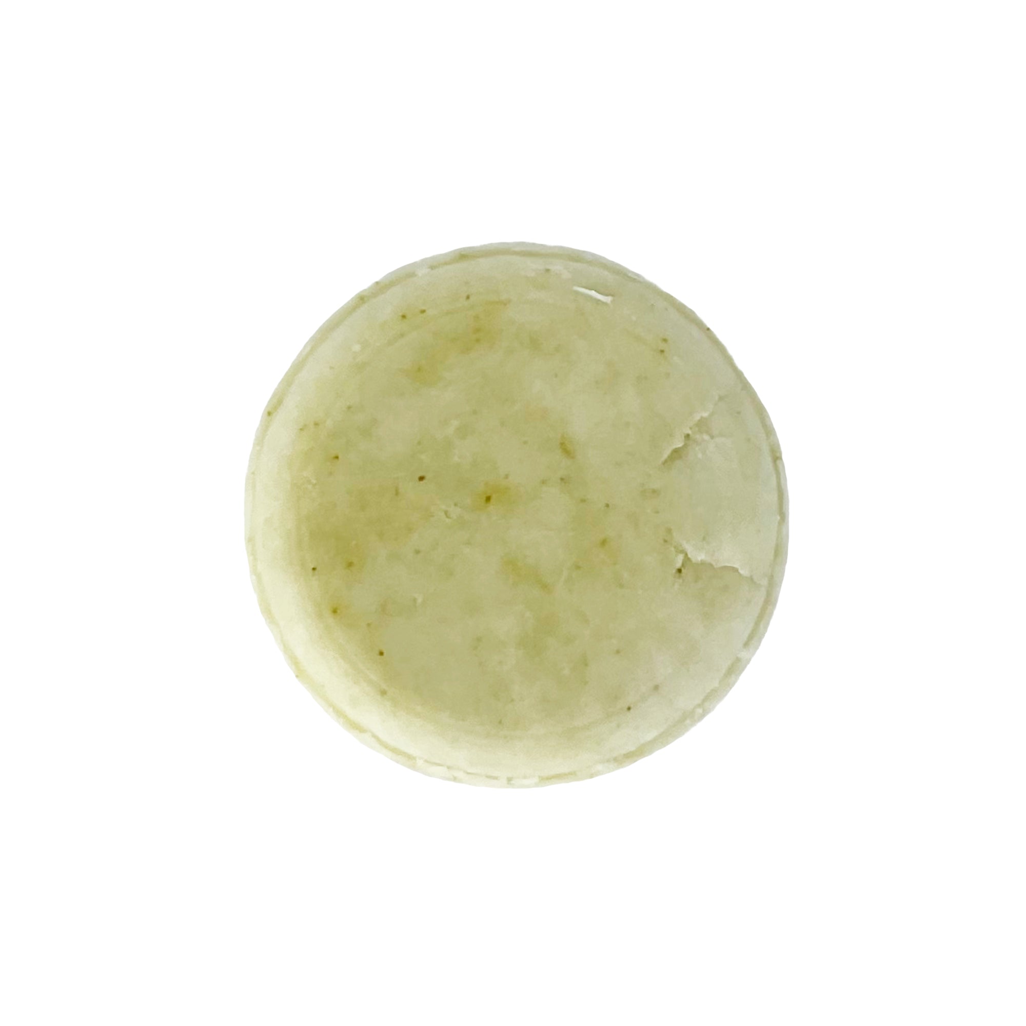 Non-toxic shampoo bar by Sweet ʻŌkole Soap with rosemary, mint, and moringa, showing the natural soap resting on a wooden surface.
