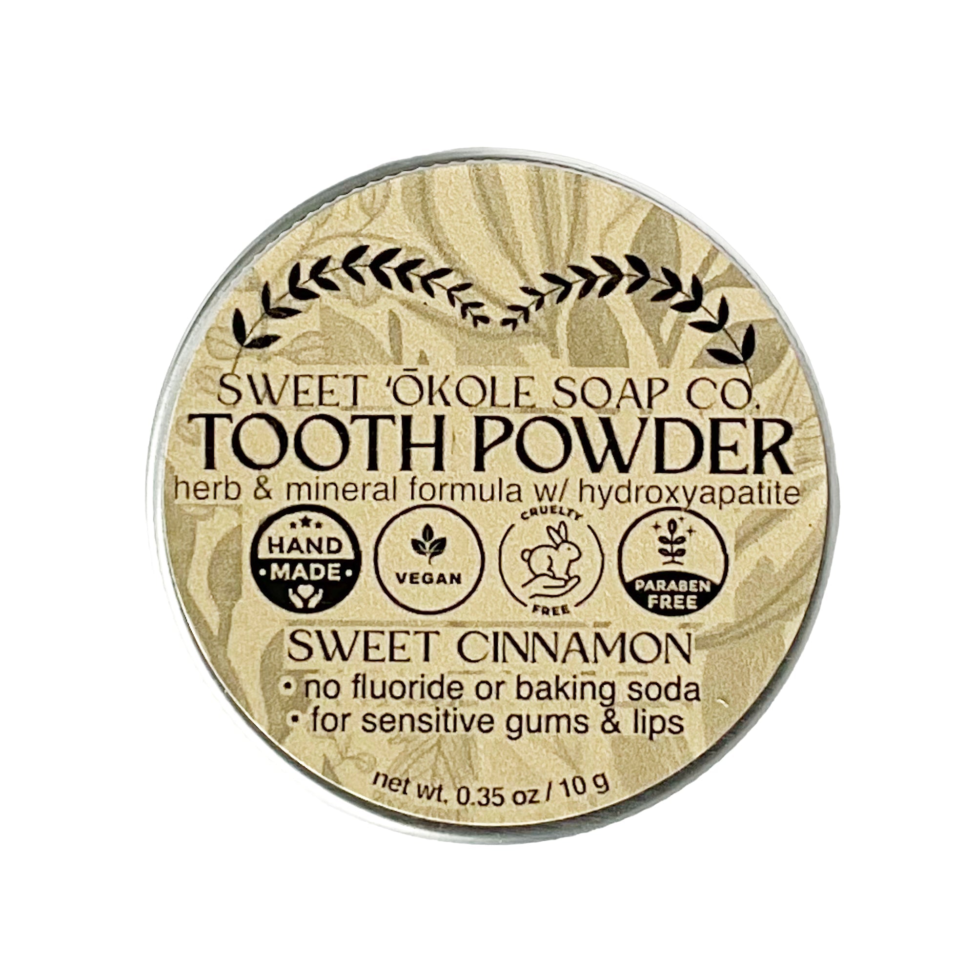 Sweet ʻŌkole Soap sweet cinnamon tooth powder with hydroxyapatite for enamel strength, shown in a natural, close-up view.