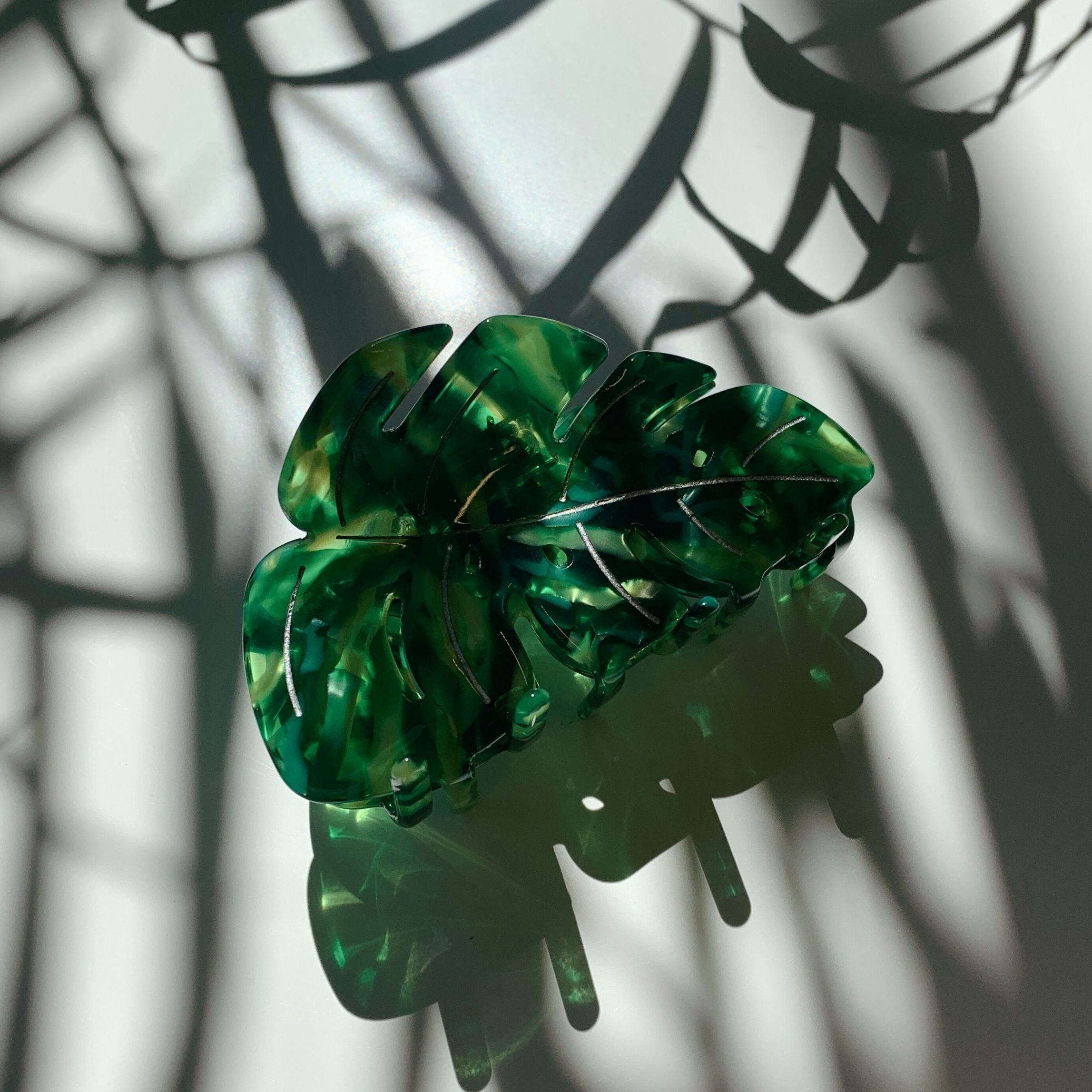 Velvet Claws Monstera leaf hair claw accessory with green leaf design, crafted by The Bullish Store, perfect for hair styling.