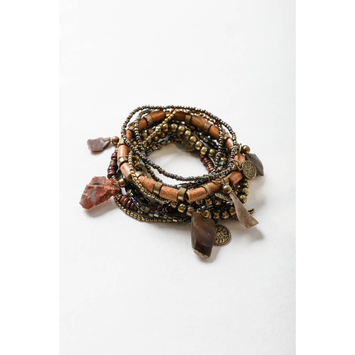 Stack of 10 boho stone and bead stretch bracelets from The Bullish Store, showcasing colorful, stackable jewelry with natural stone accents.