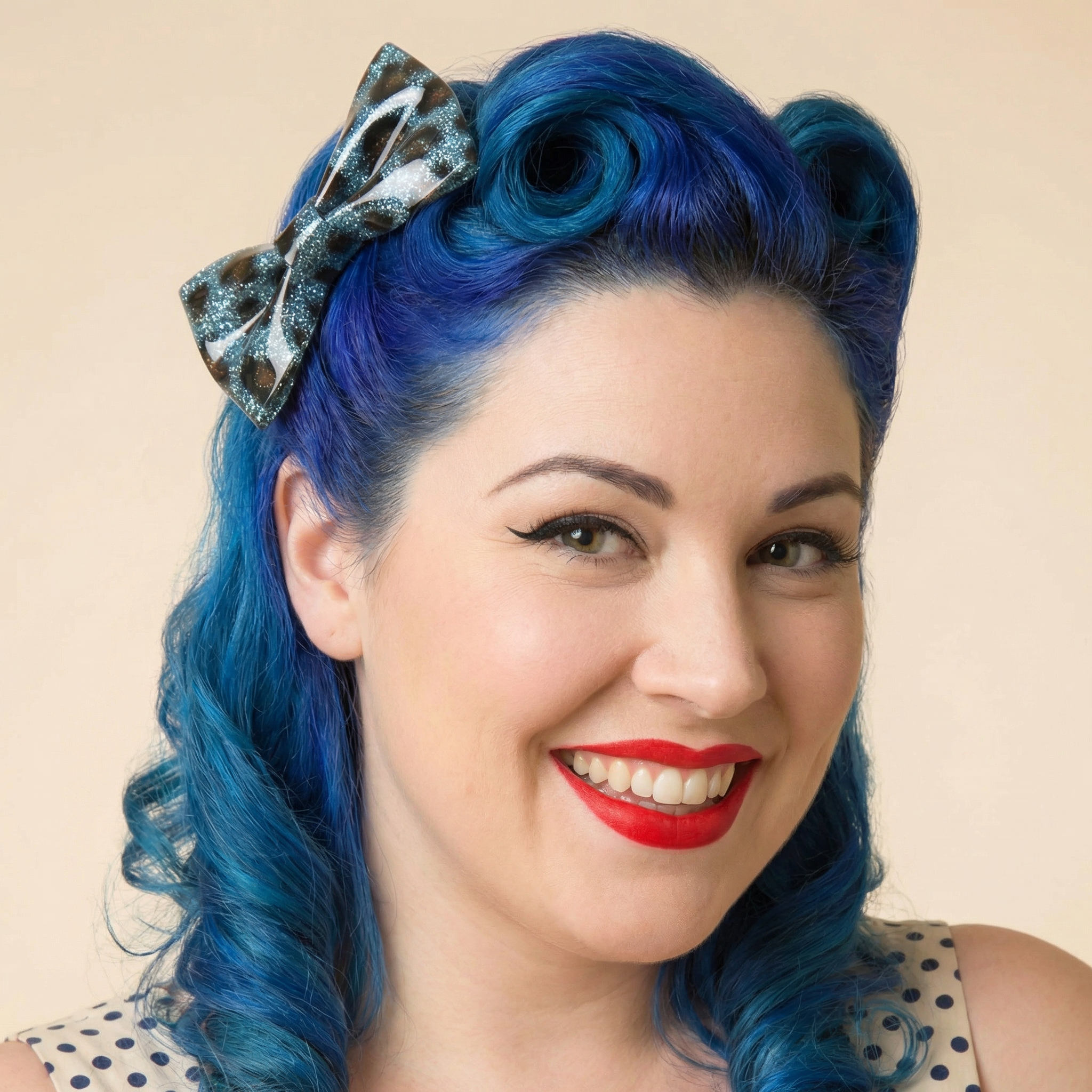 Set of two Sourpuss blue leopard glitter hair bows, rockabilly hair accessories, leopard print hair clips for vintage style.