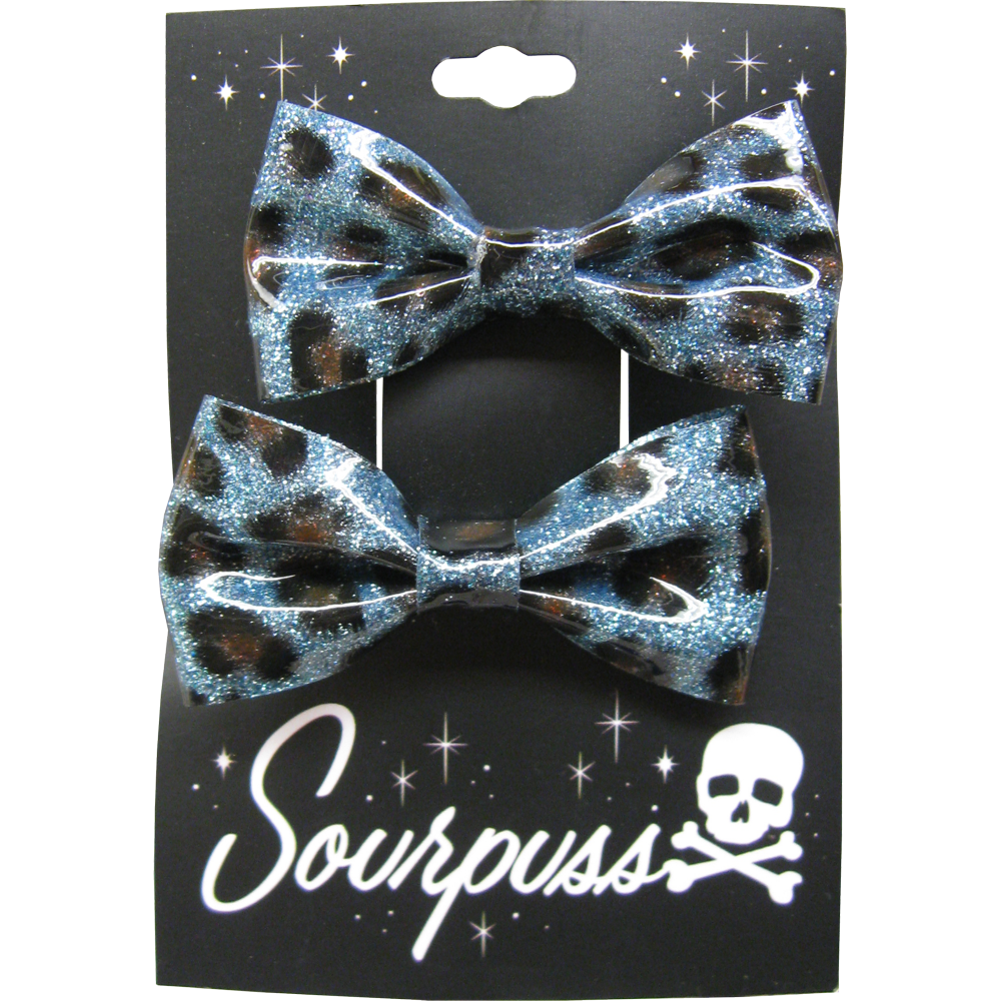 Set of two blue leopard glitter hair bows by Sourpuss, rockabilly hair clips with leopard print design, stylish hair accessories.