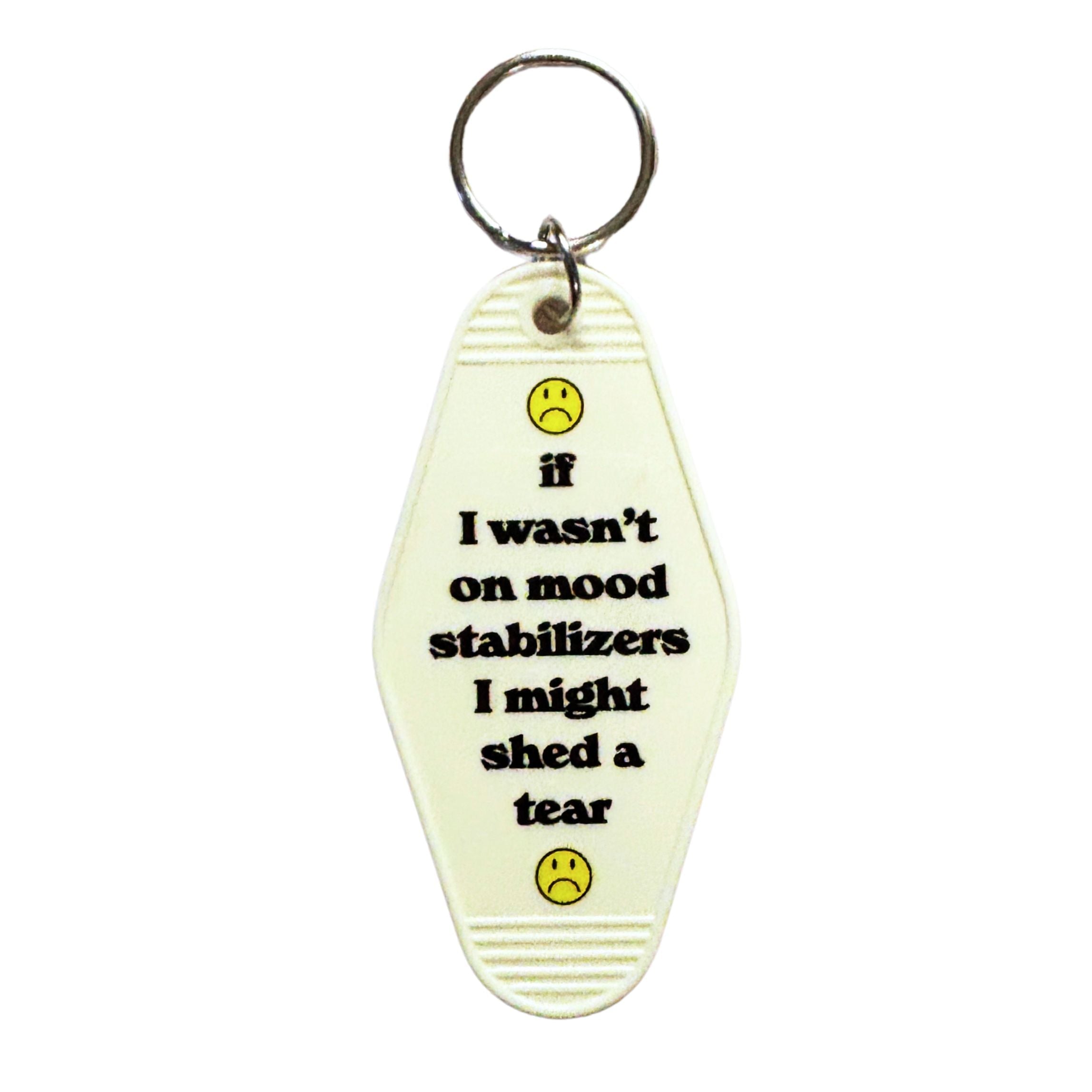 White vintage motel keychain with mood stabilizer design from The Bullish Store, featuring a retro-inspired charm.