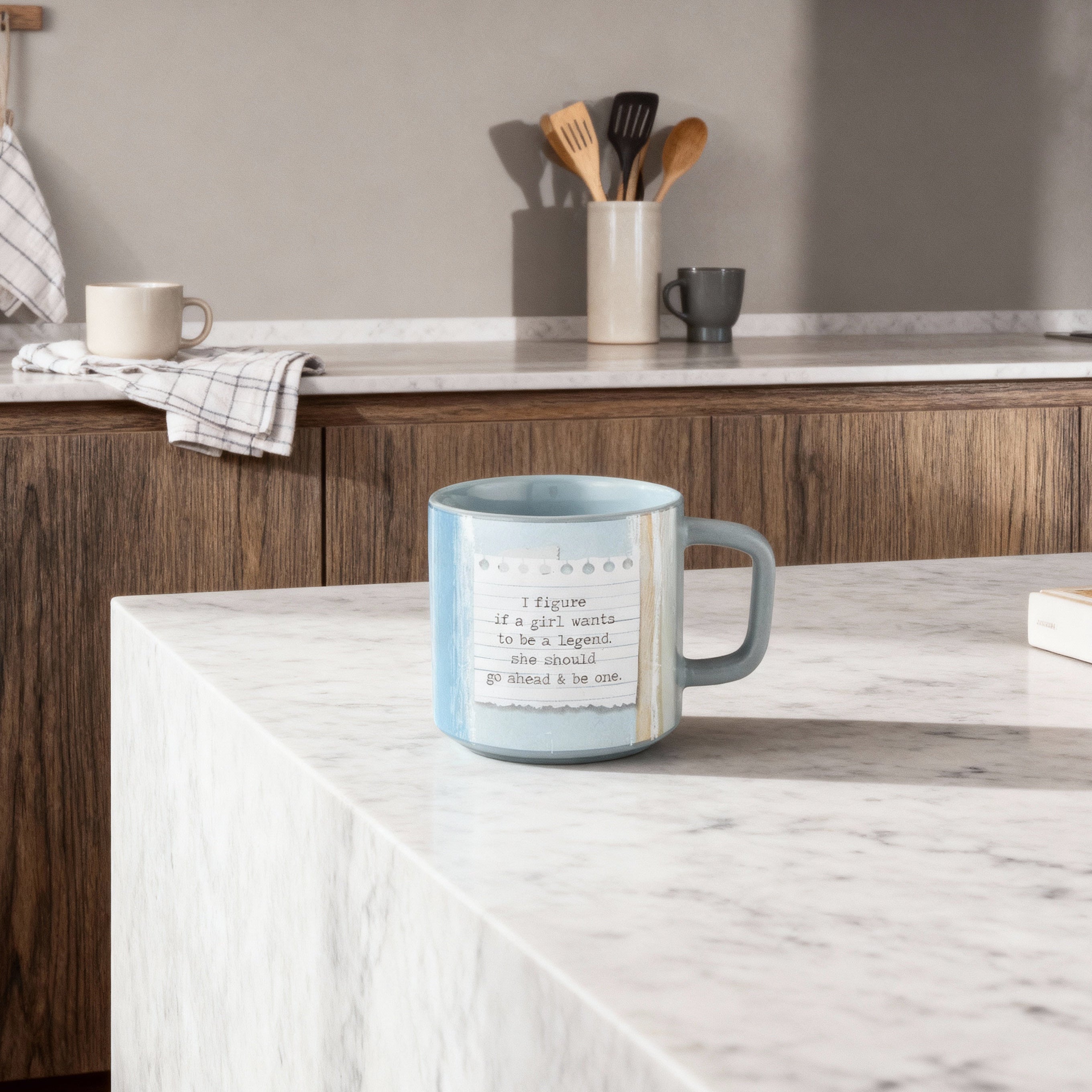 Calamity Jane "If a Girl Wants To Be A Legend" 14oz stoneware coffee mug, featuring bold design and lettering.