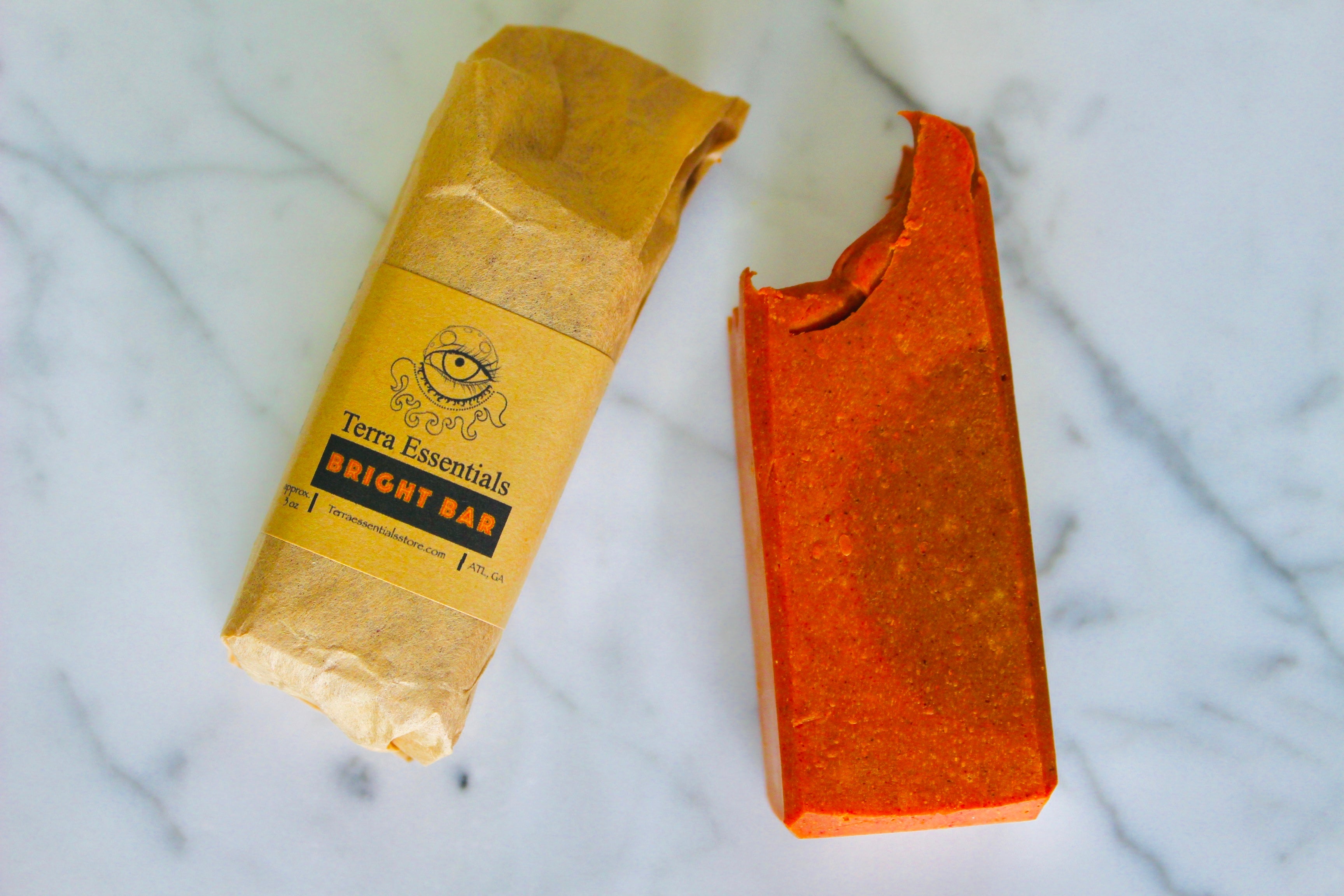 Bright Bar by The Earthly Alternative, a natural health supplement with a sleek design, shown in a close-up image.